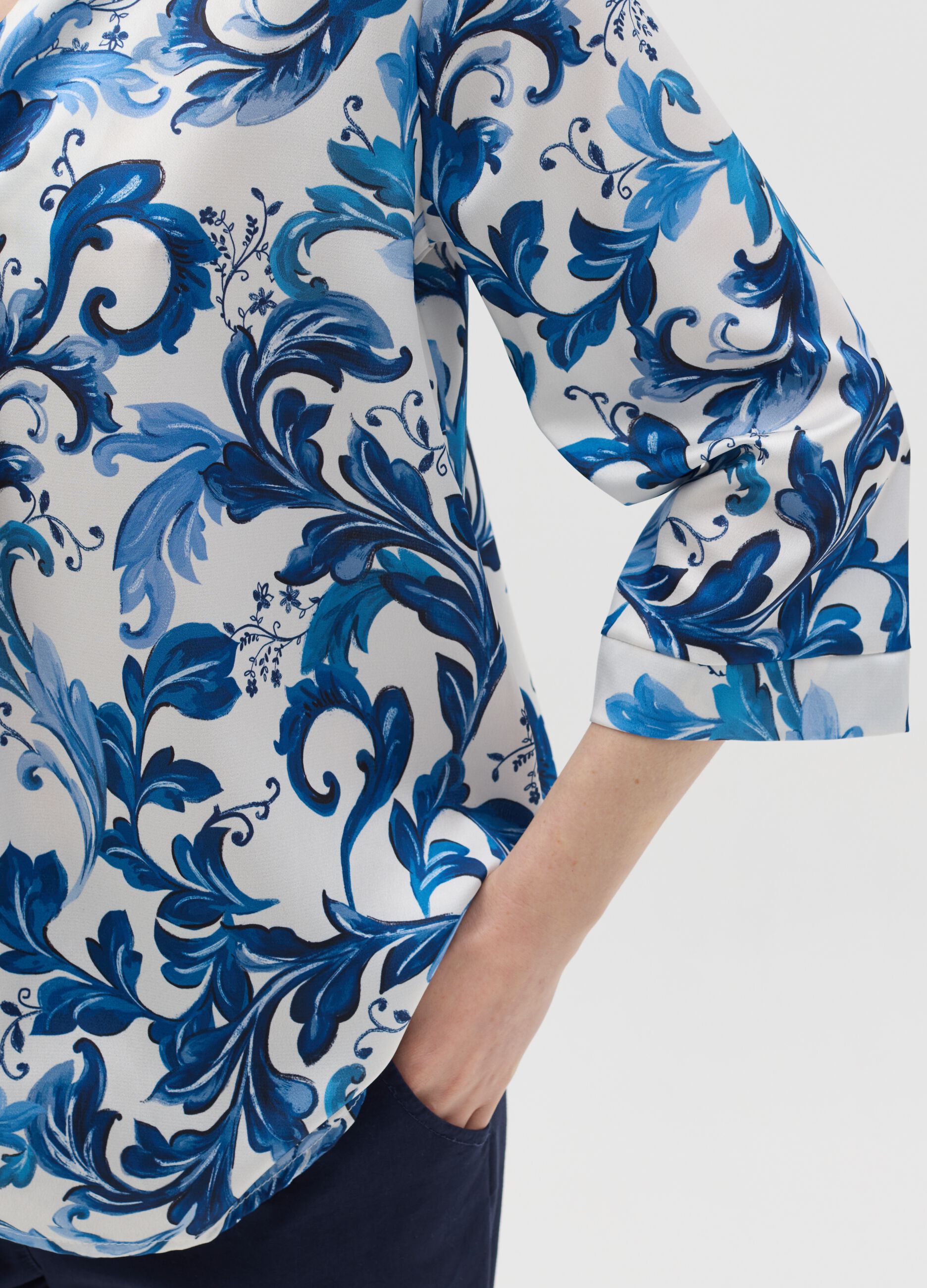 White and blue blouse with print