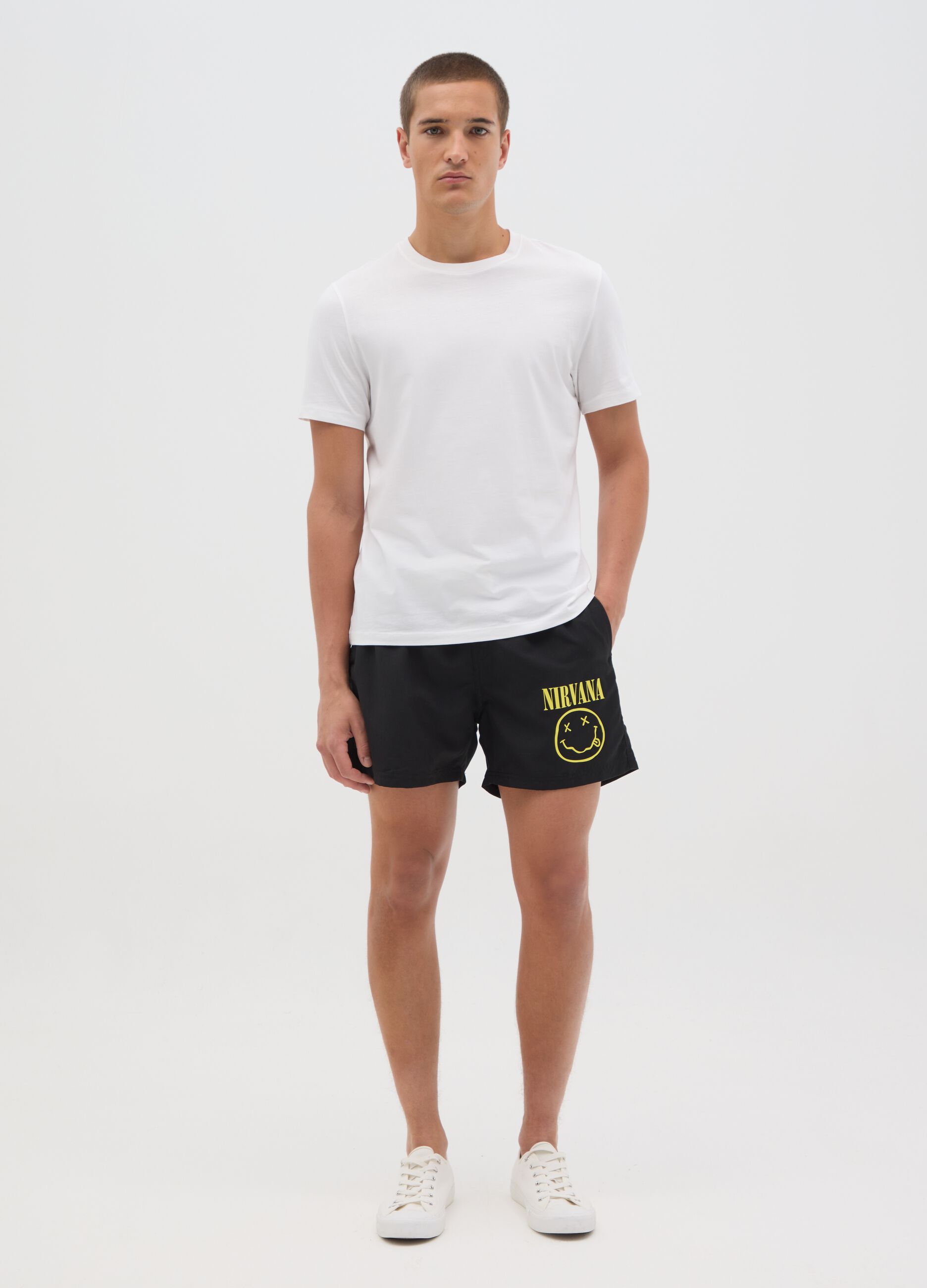 Black swimming trunks with Nirvana logo