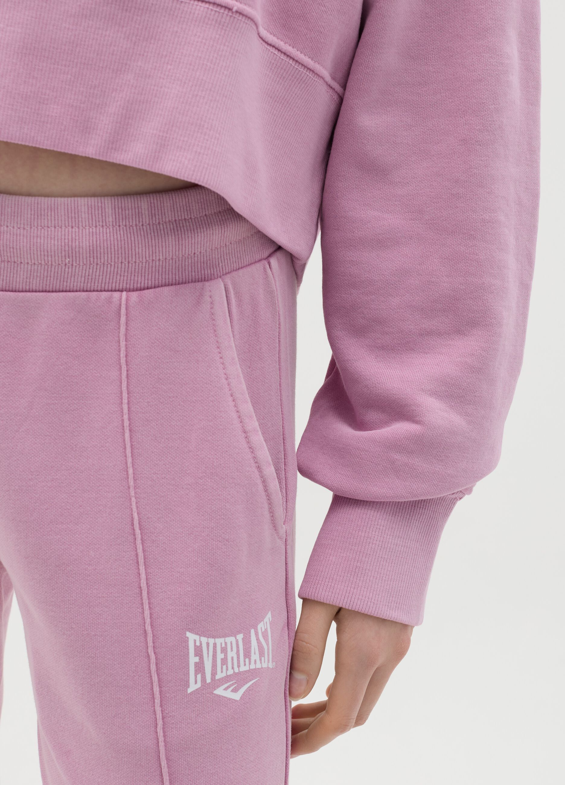 Pink joggers with elasticated edging and logo print