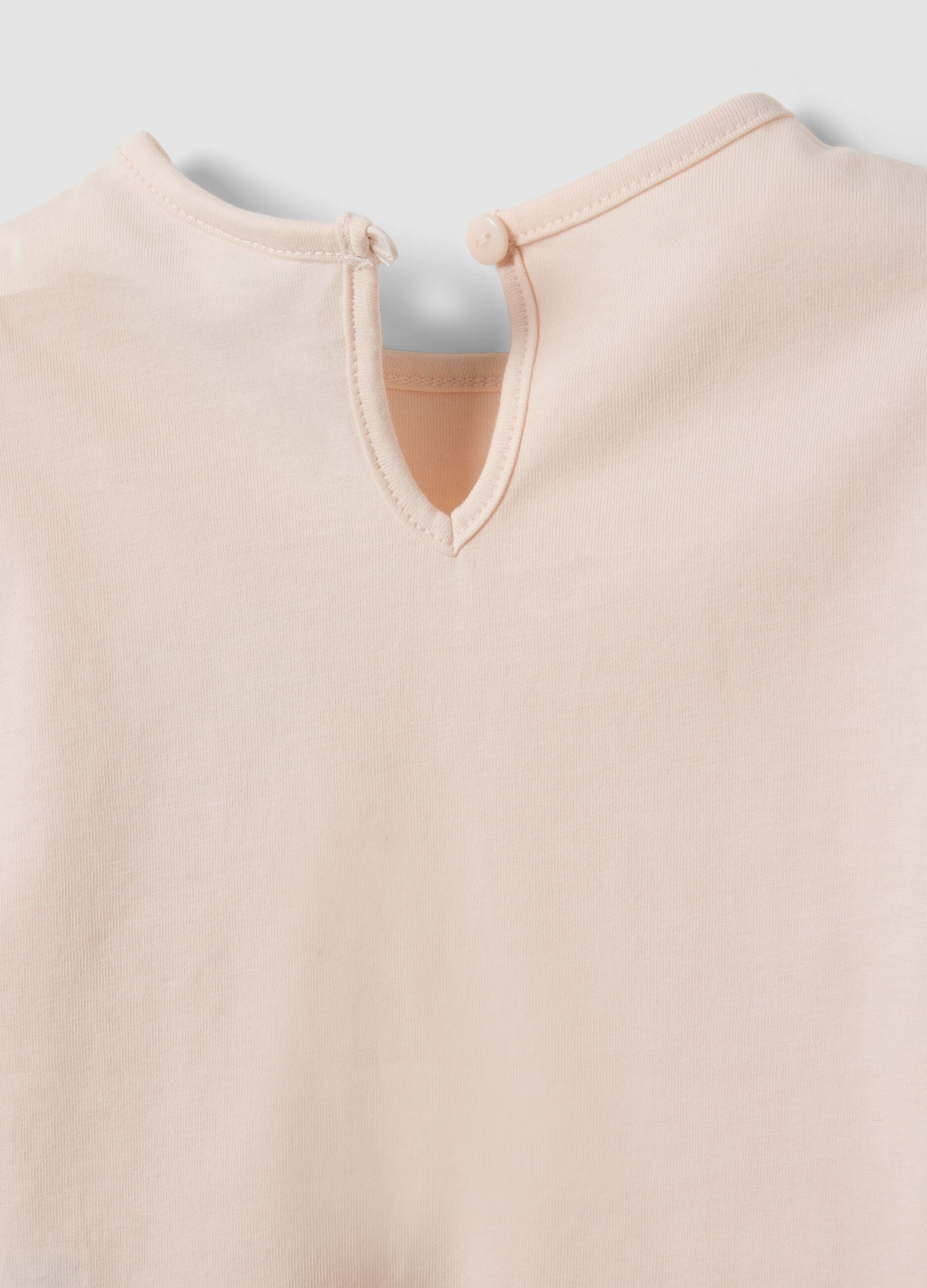 Orange organic cotton T-shirt with leopard print for baby girl