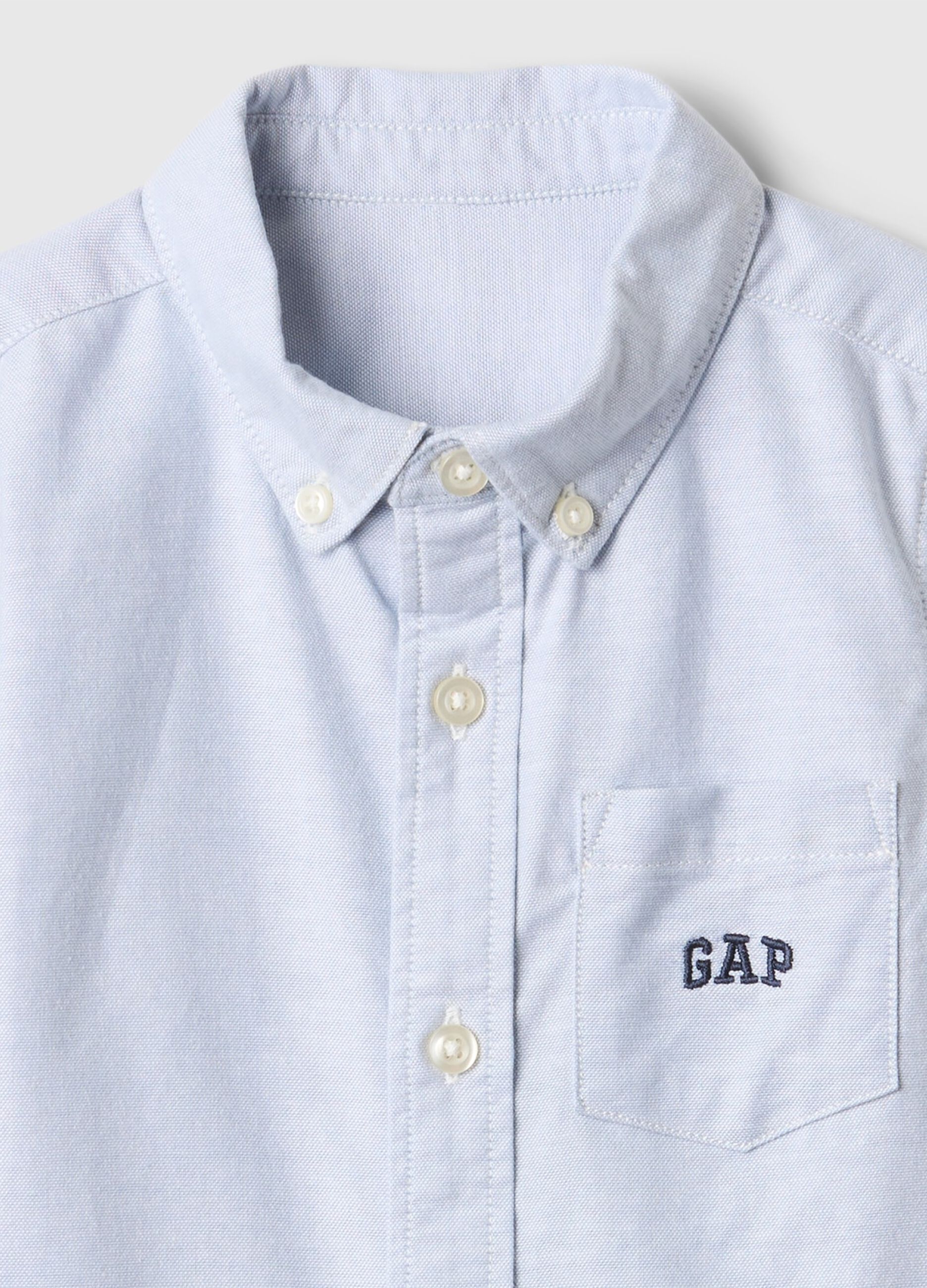 Camicia azzurra elasticizzata a maniche lunghe