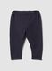Grey stretch cotton joggers with turn-up cuffs for baby girl_1