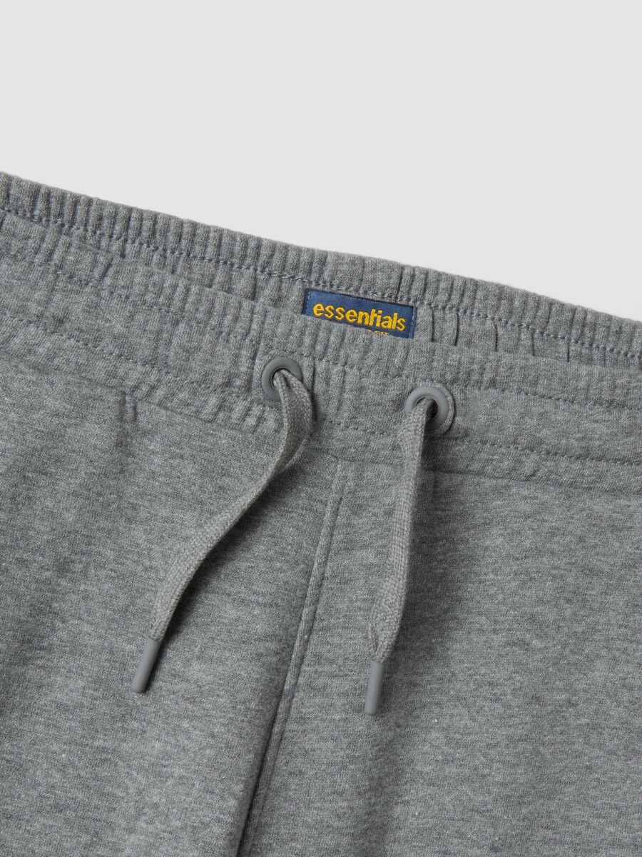 Pantaloni jogger grigio melange in misto cotone organico e viscosa_1