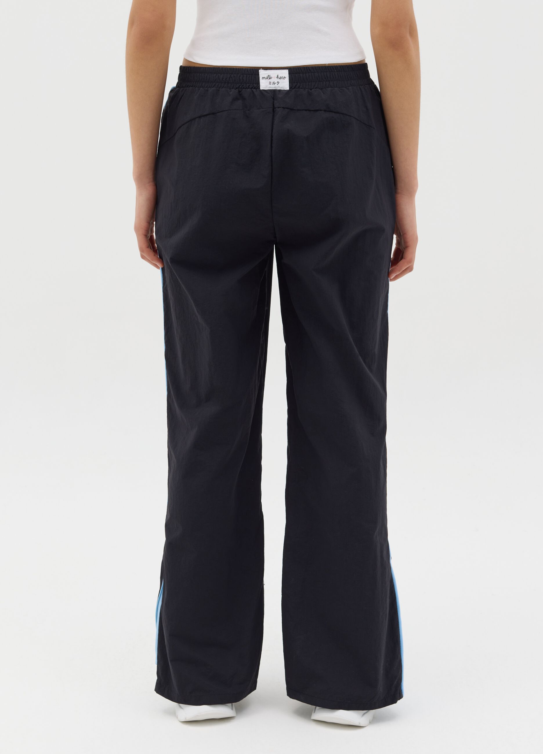 Joggers in nylon con spacchetti e zip nero