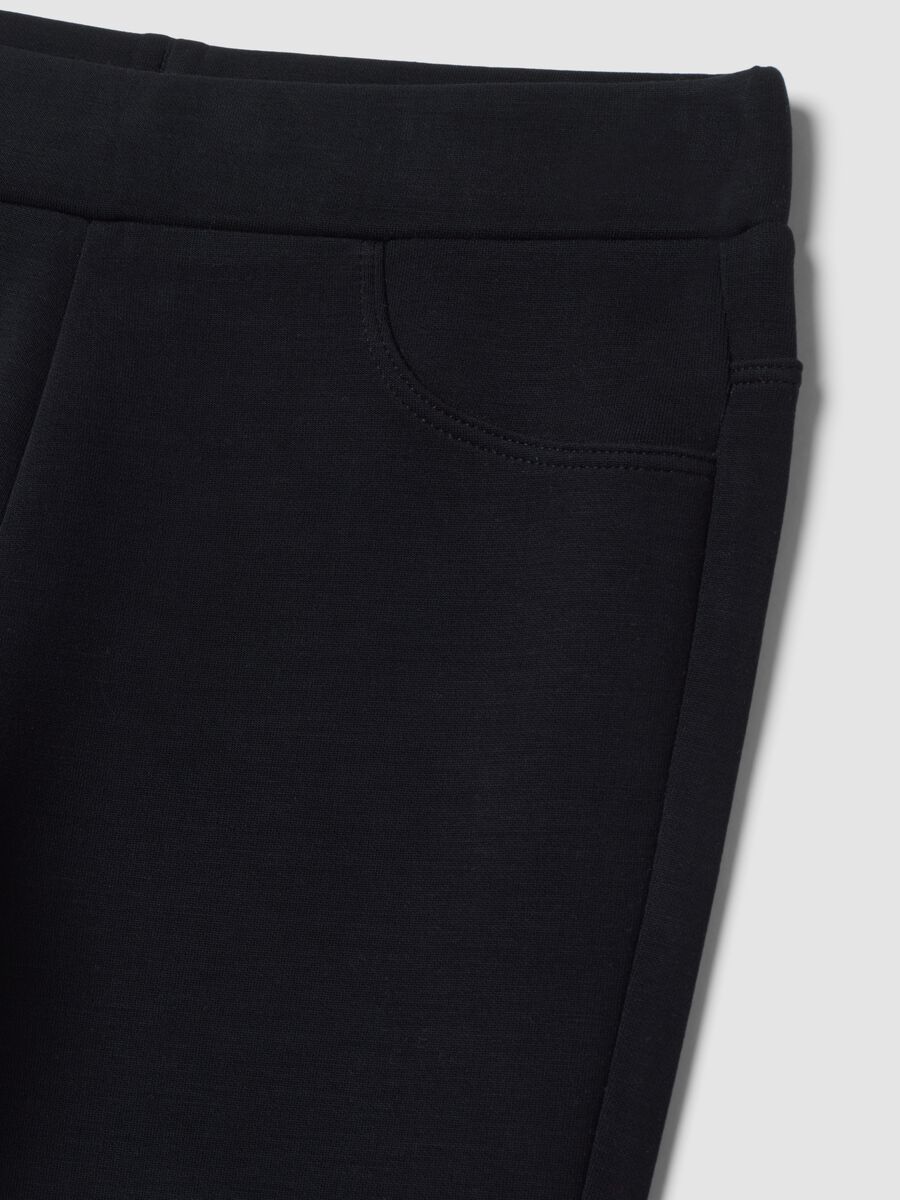Black breathable stretch-modal flared trousers_1