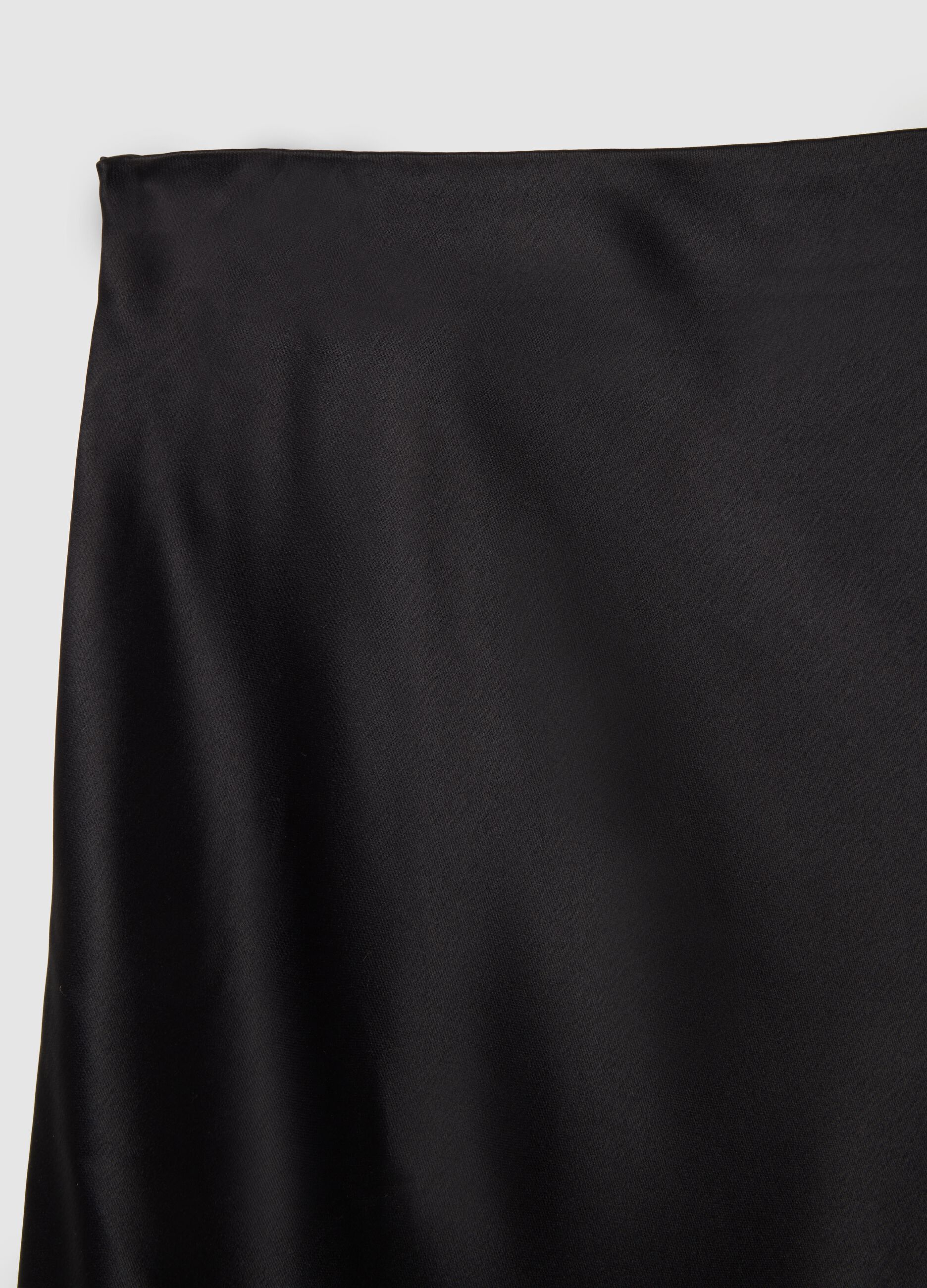 Black skirt in stretch satin fabric