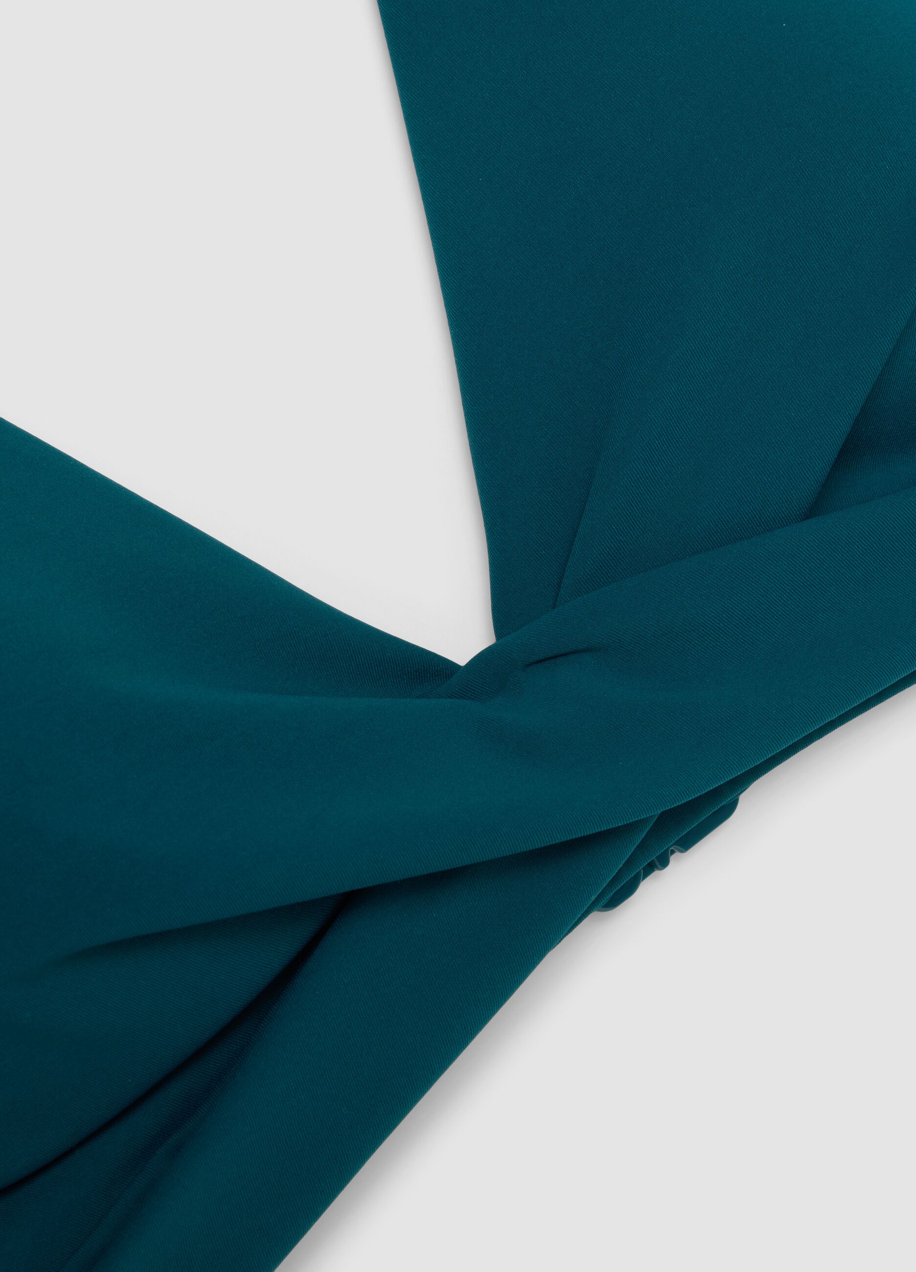Green triangle bikini top in stretch fabric with shaping effect