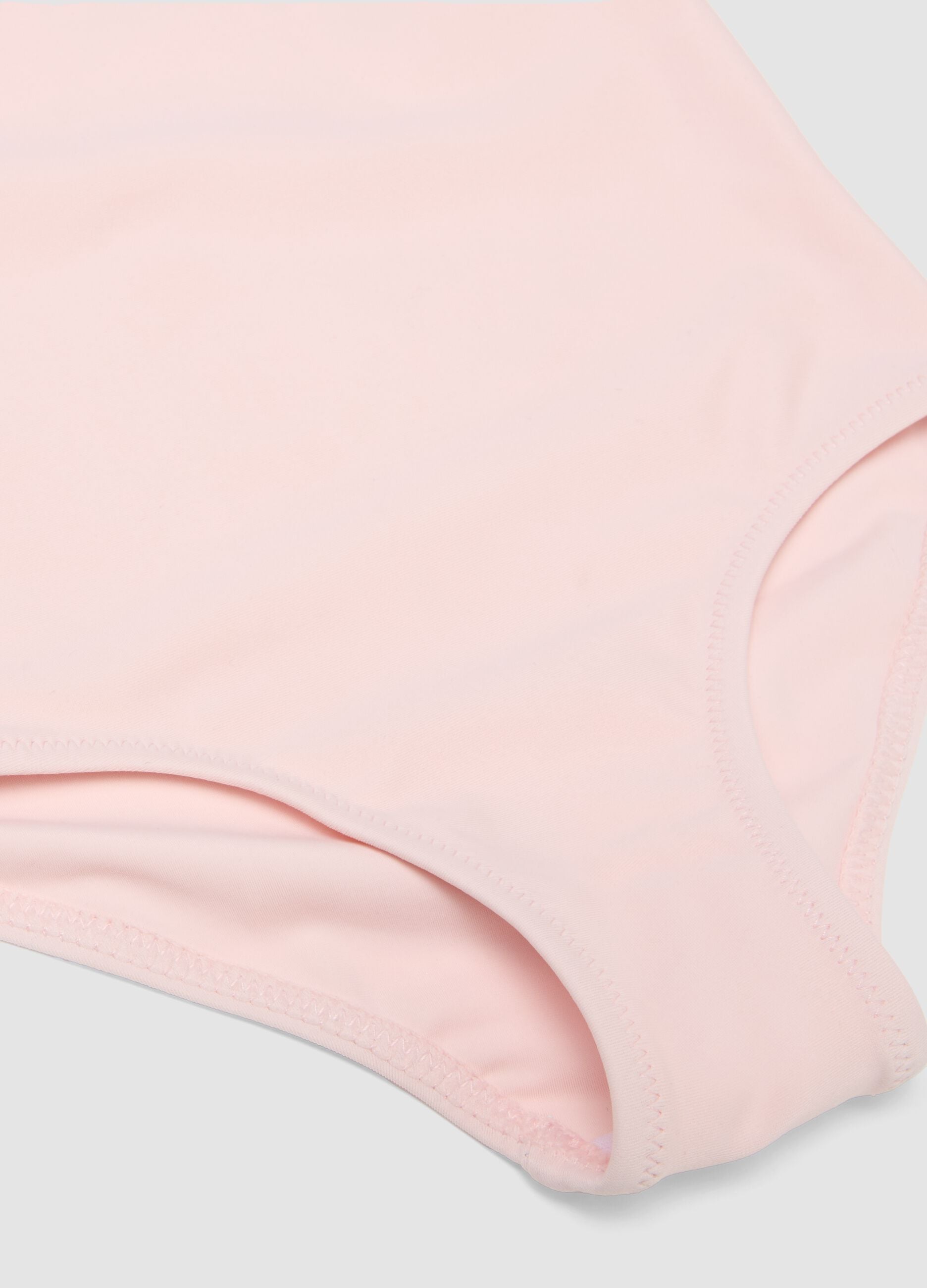 Pink girls&rsquo; swimsuit in stretch fabric with ruffle