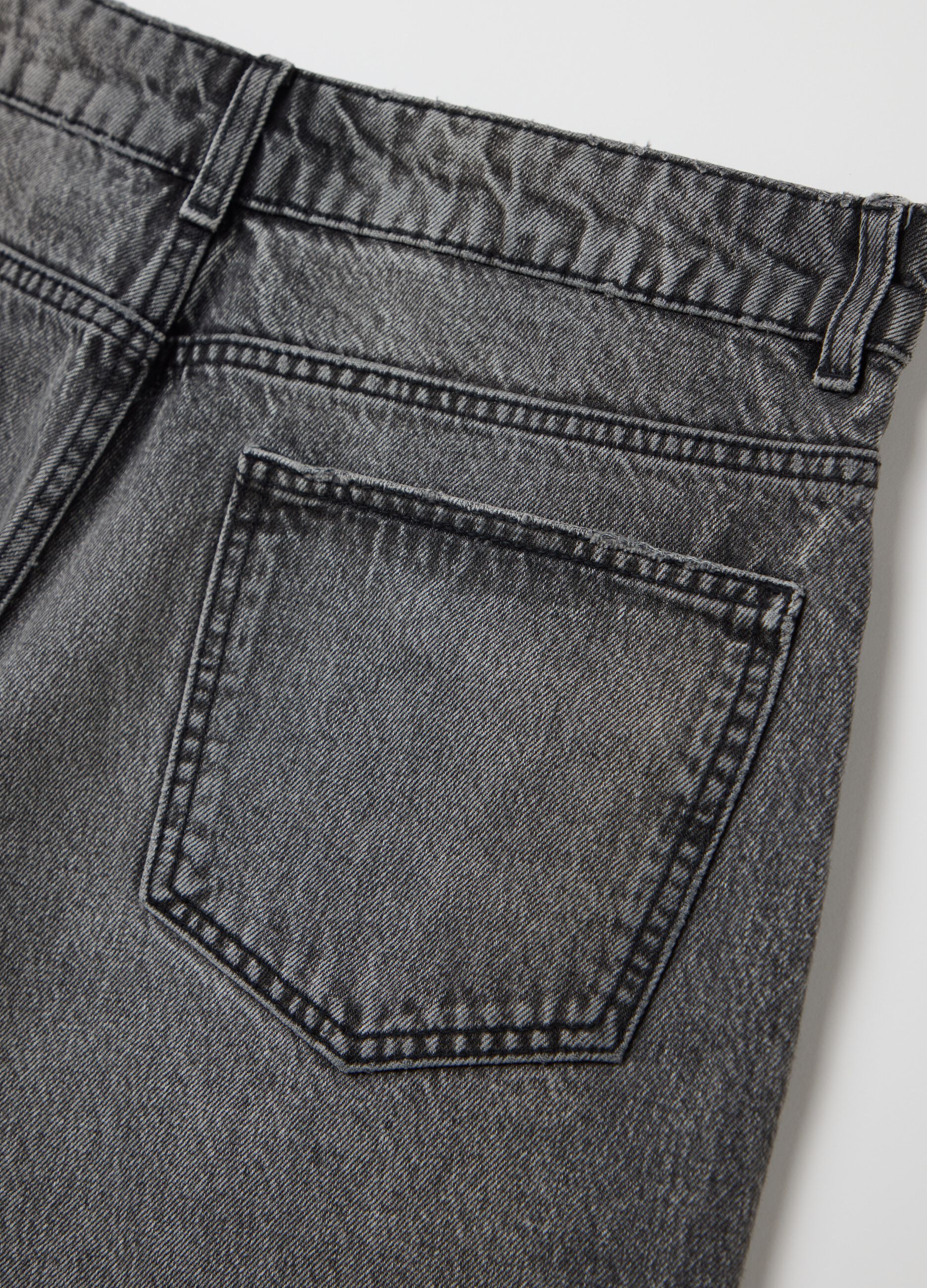 Black denim shorts with ripped details