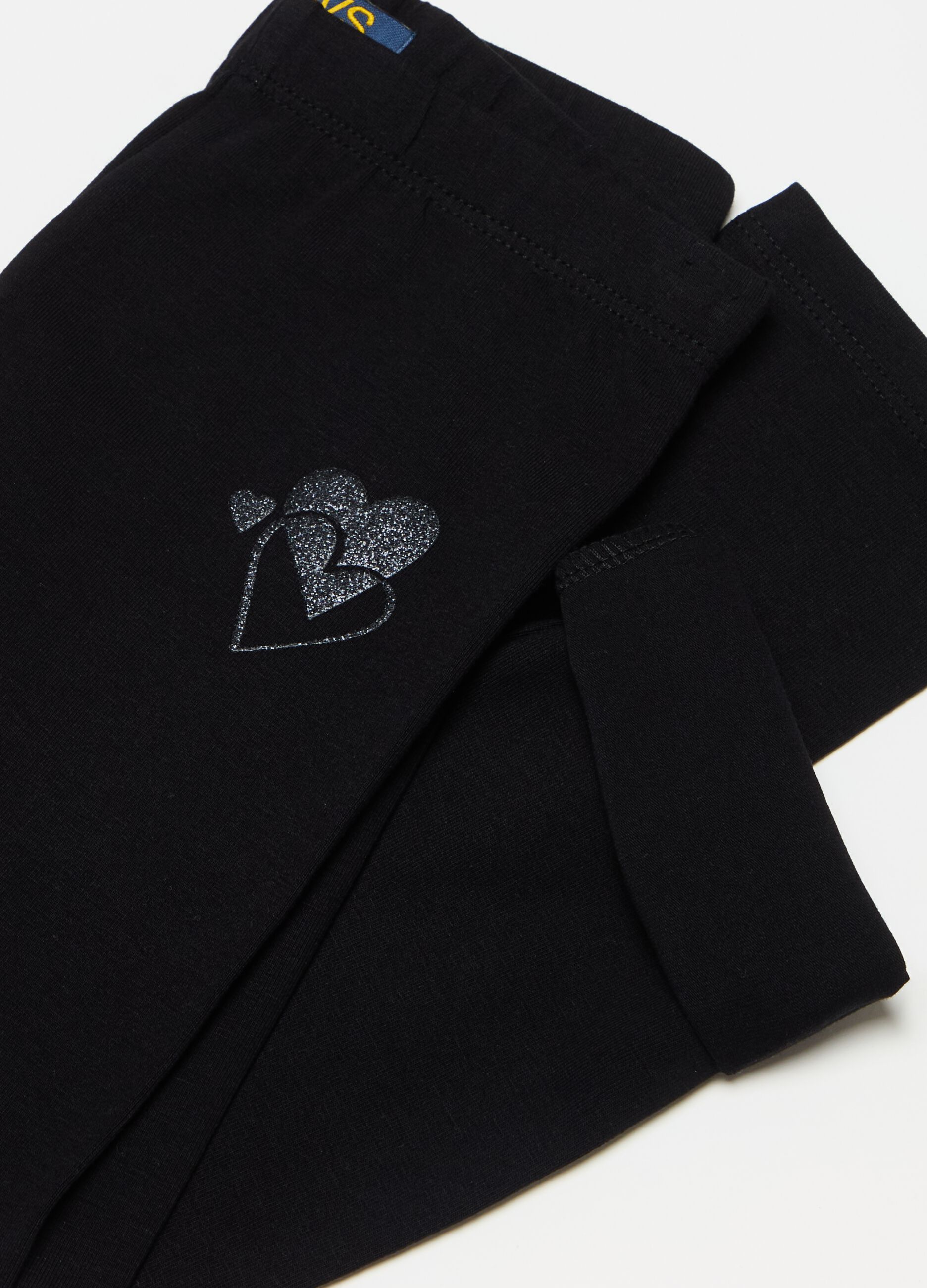 Three-quarter leggings with glitter