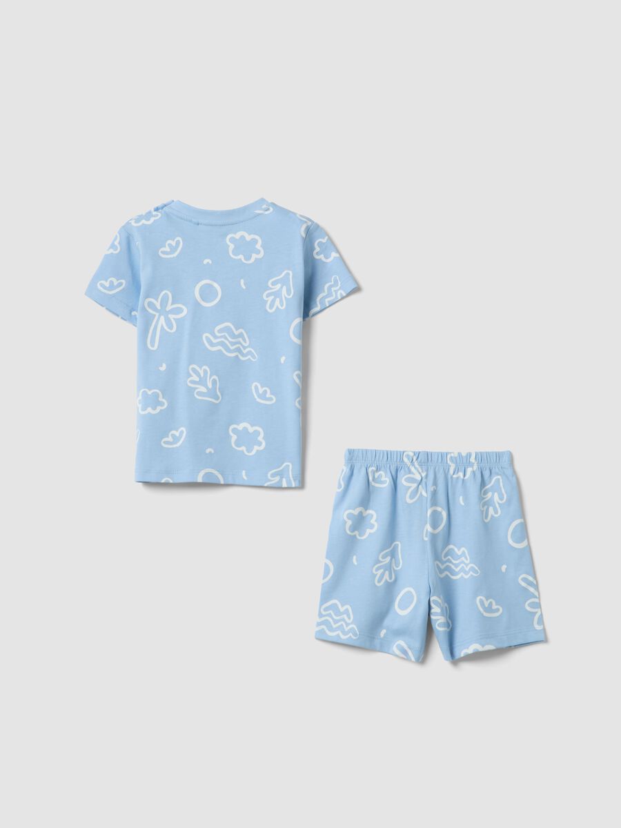 Pigiama corto azzurro in puro cotone da neonato con motivo marittimo_1