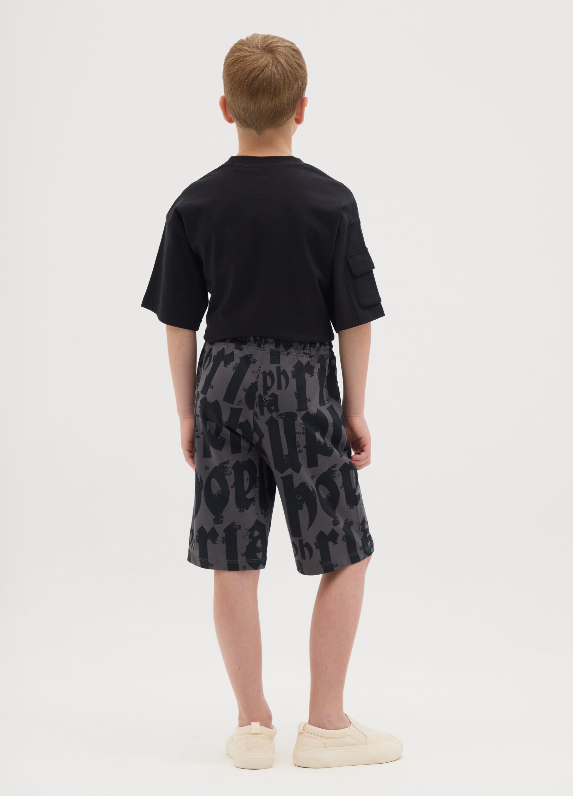 Grey French terry shorts with print