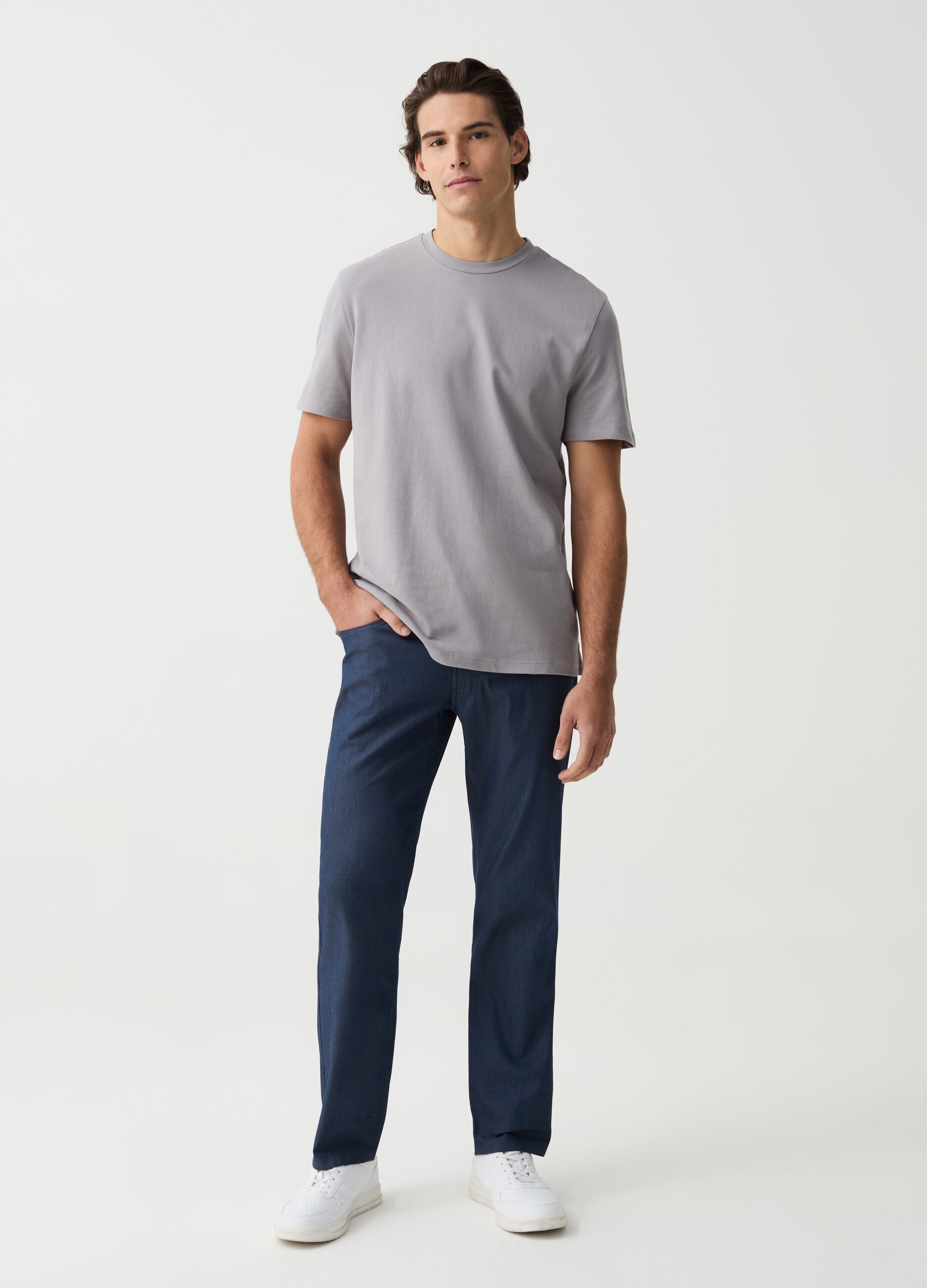 Slim-fit trousers with thin stripes