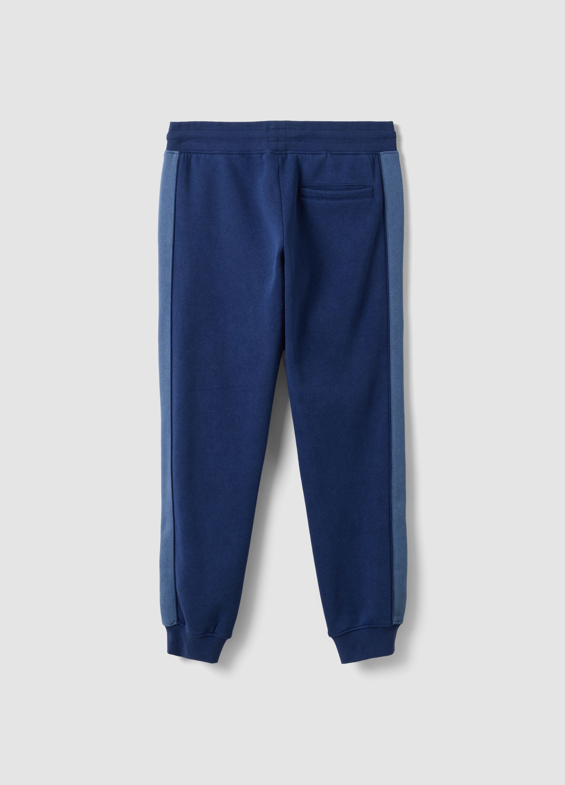 Blue cotton-blend joggers with print