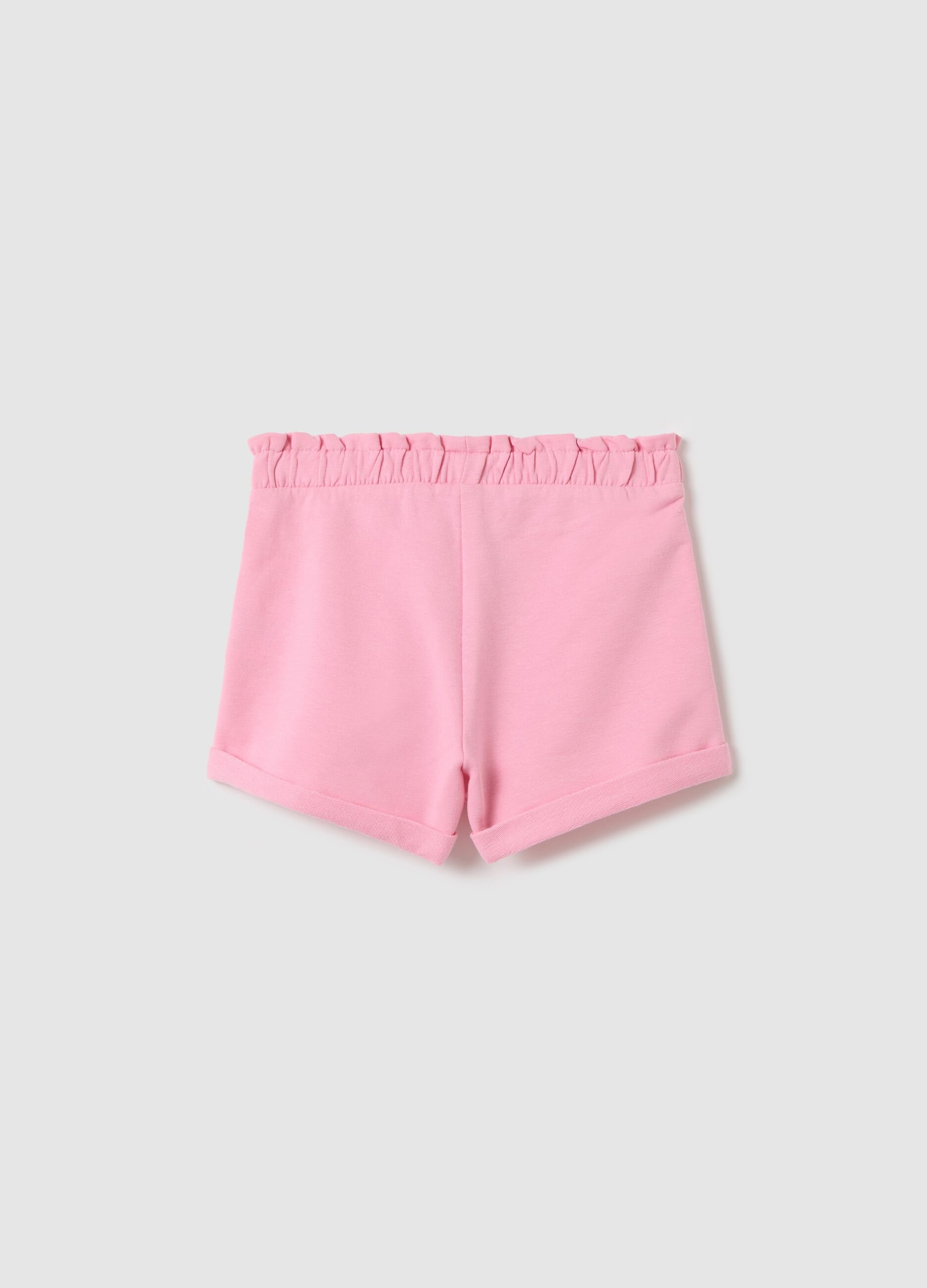 Pink French terry shorts with bow and frills