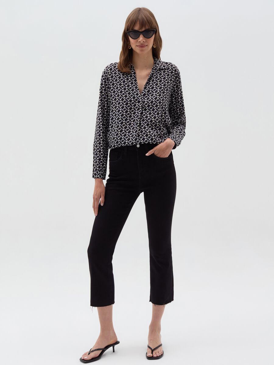 Blusa con scollo a polo maniche lunghe_1