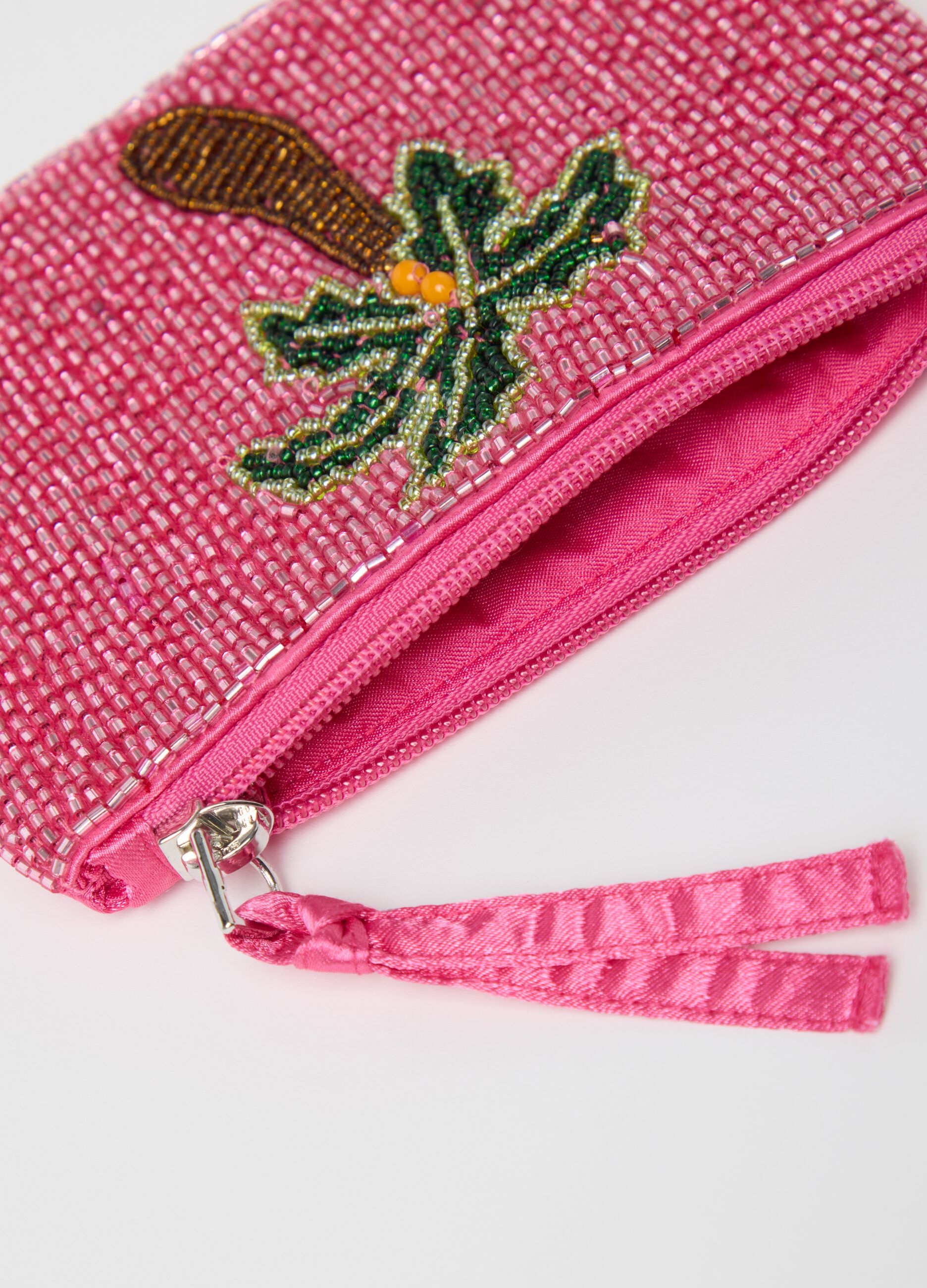 Pink wallet with glass and palm decoration