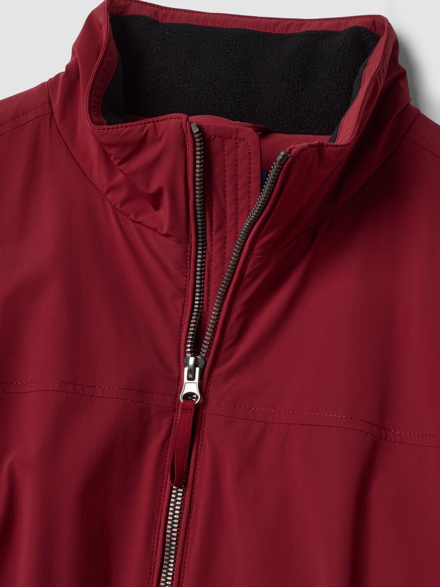 Giubbotto rosso in tessuto elasticizzato con zip_1