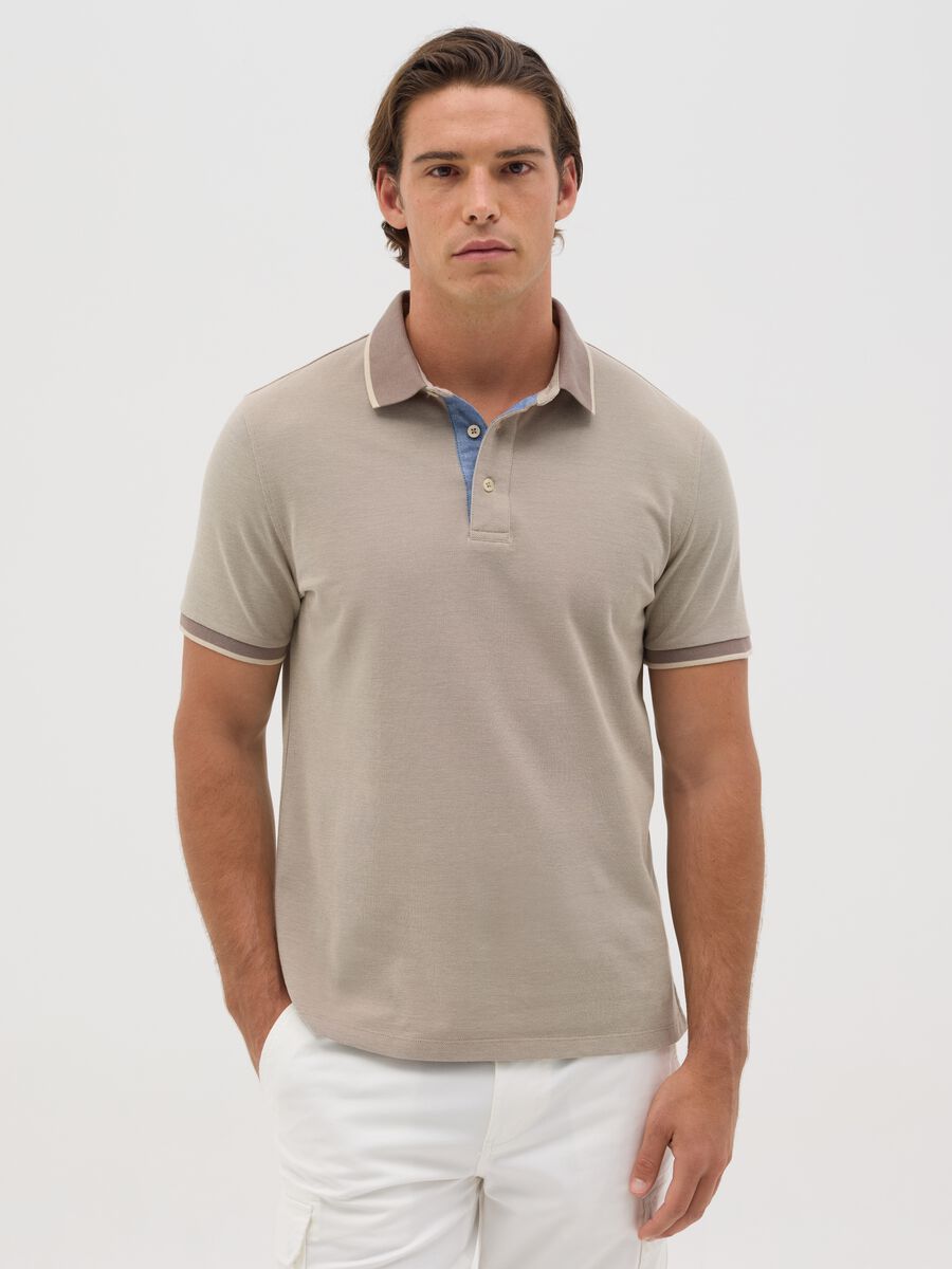 Beige polo shirt with short sleeves in cotton piquet_0