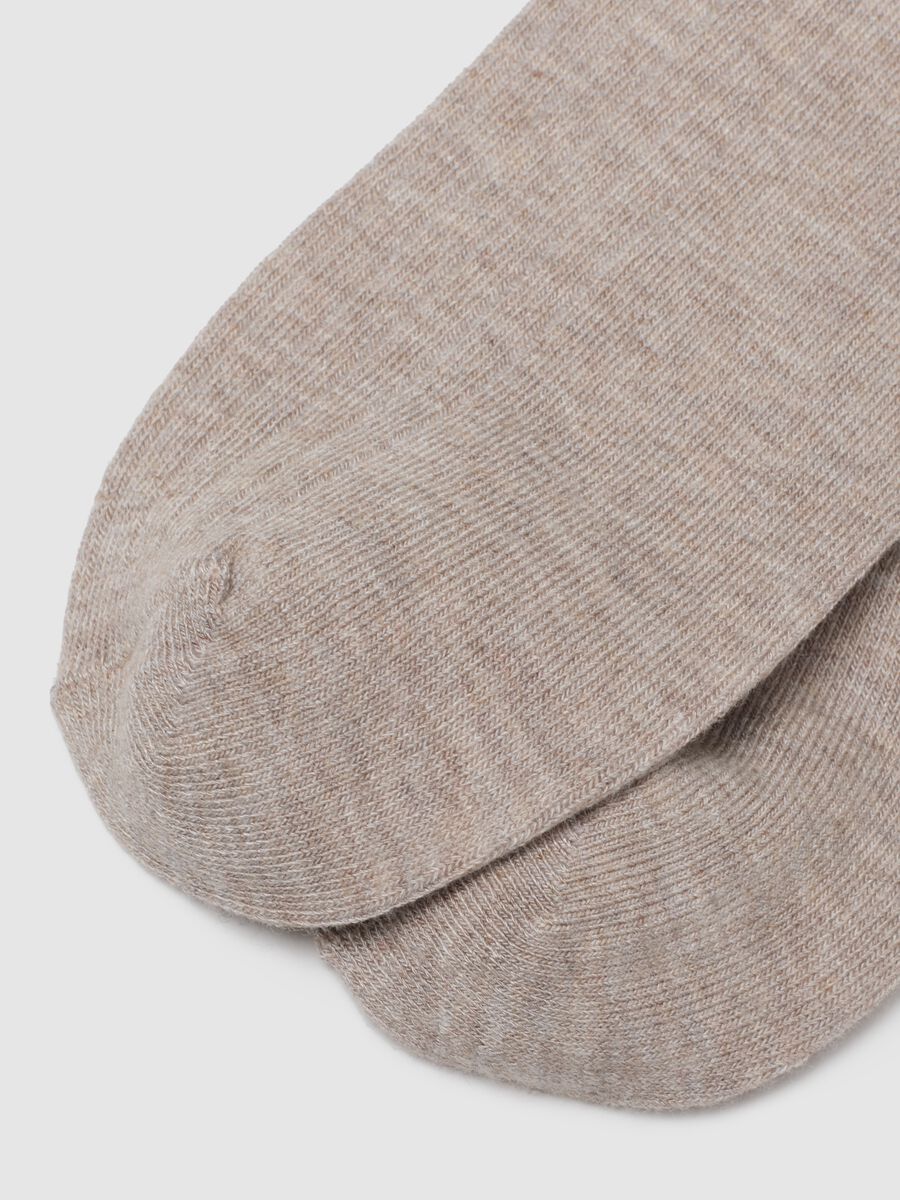 Calzini beige lunghi elasticizzati_1
