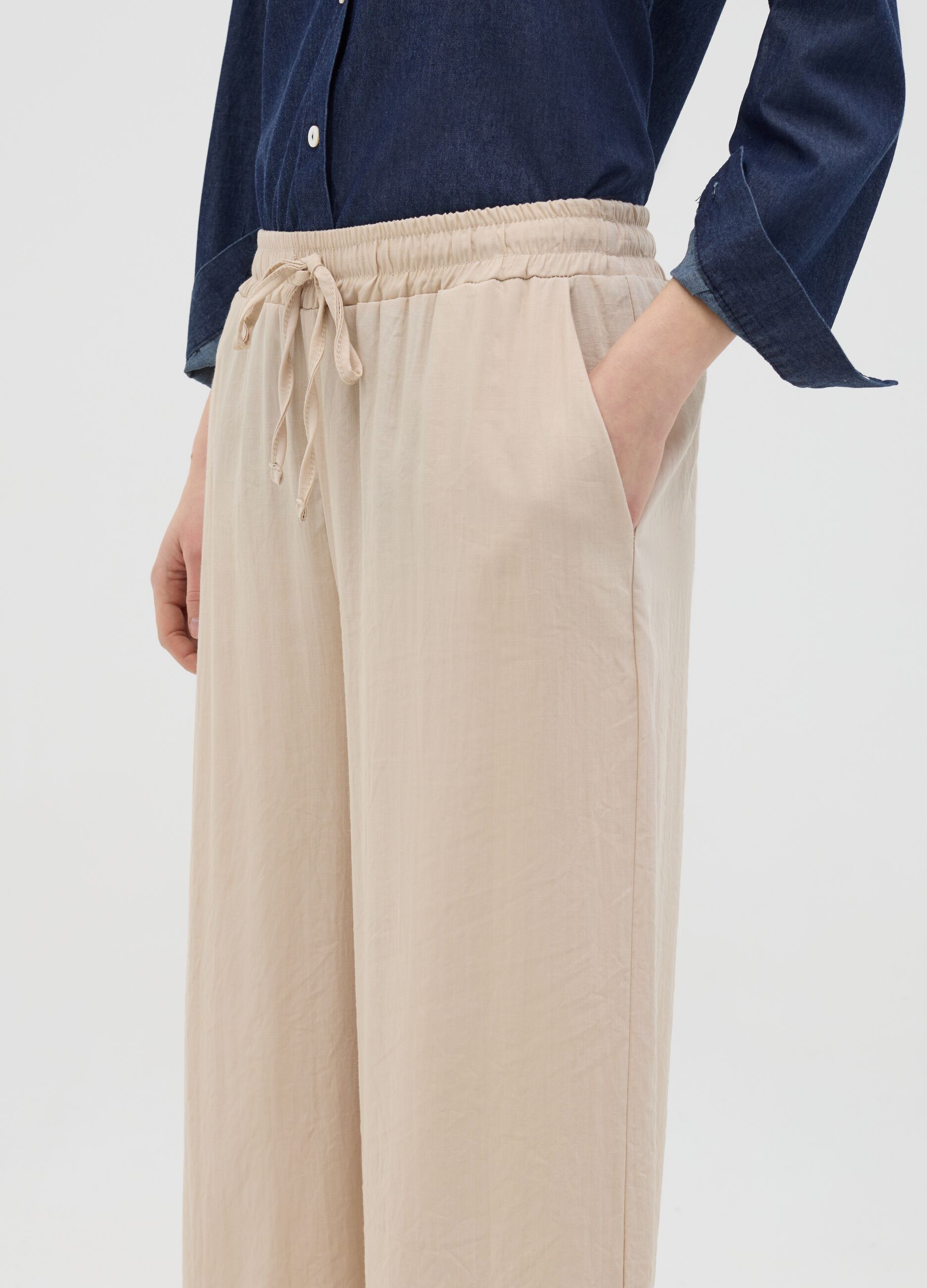 Beige wide-leg trousers