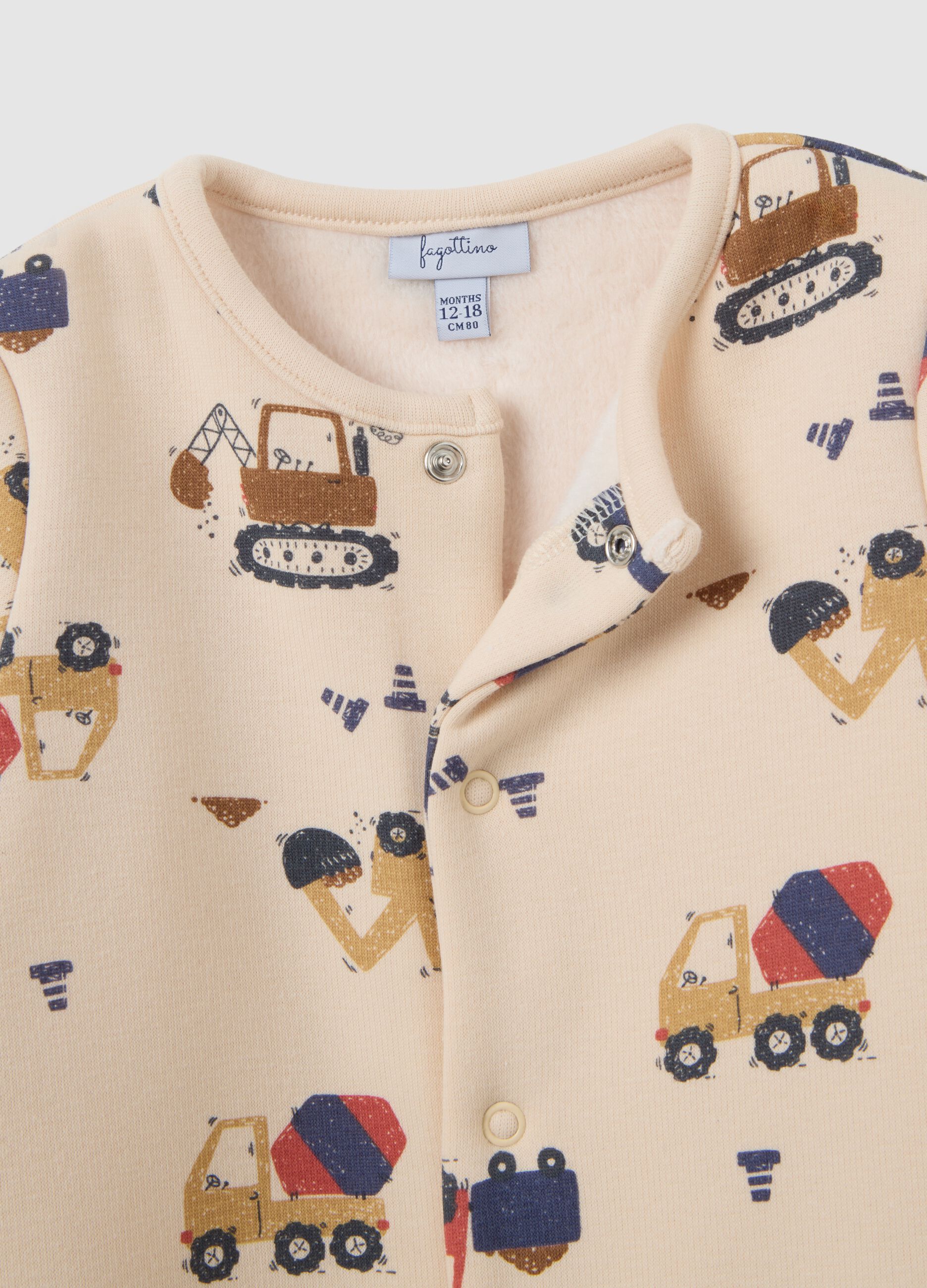 Beige baby sleepsuit with vehicle print