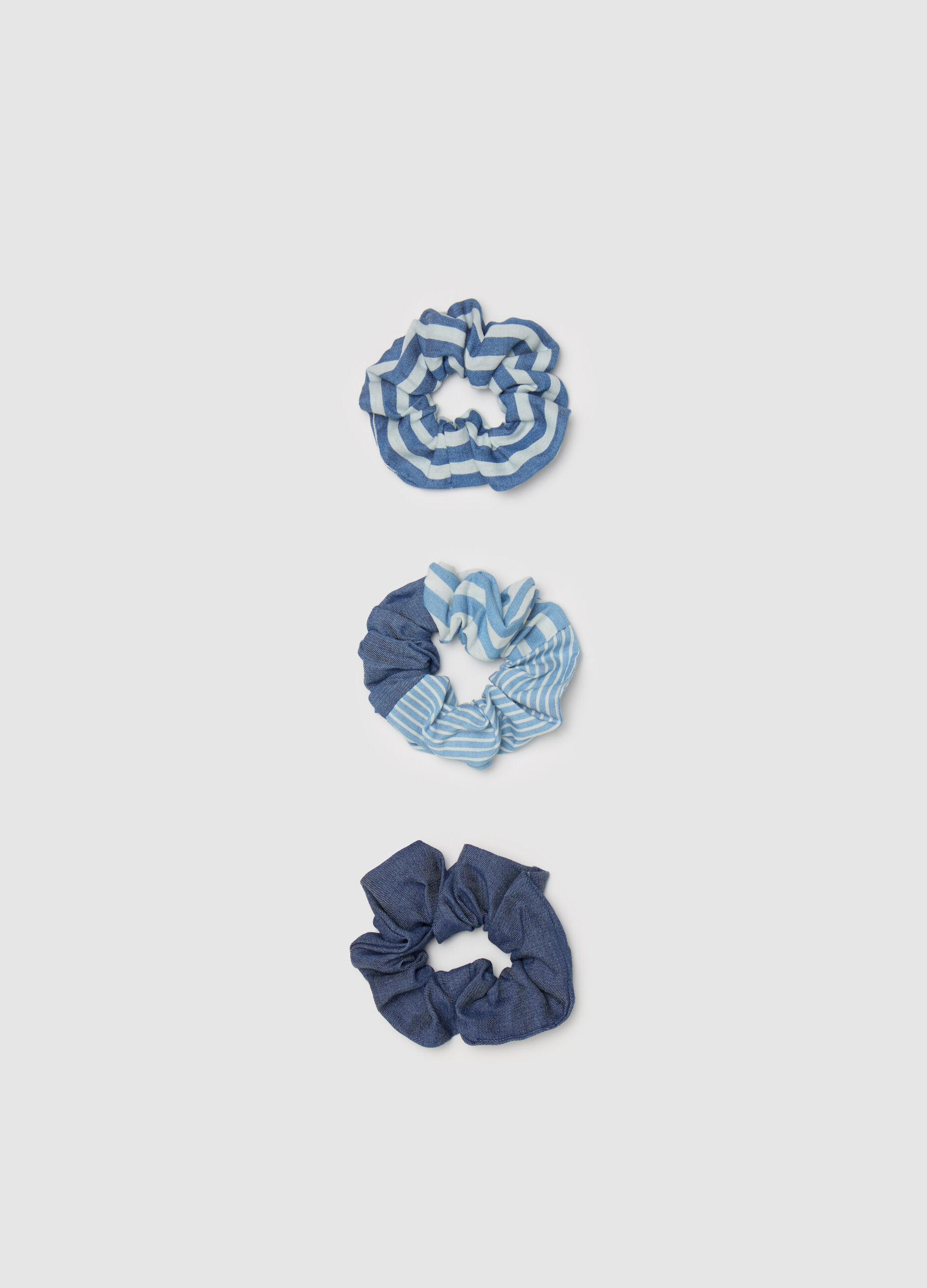 Three-pack hair elastics with white and blue stripes