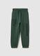 Children's green jogger trousers in pure cotton_0