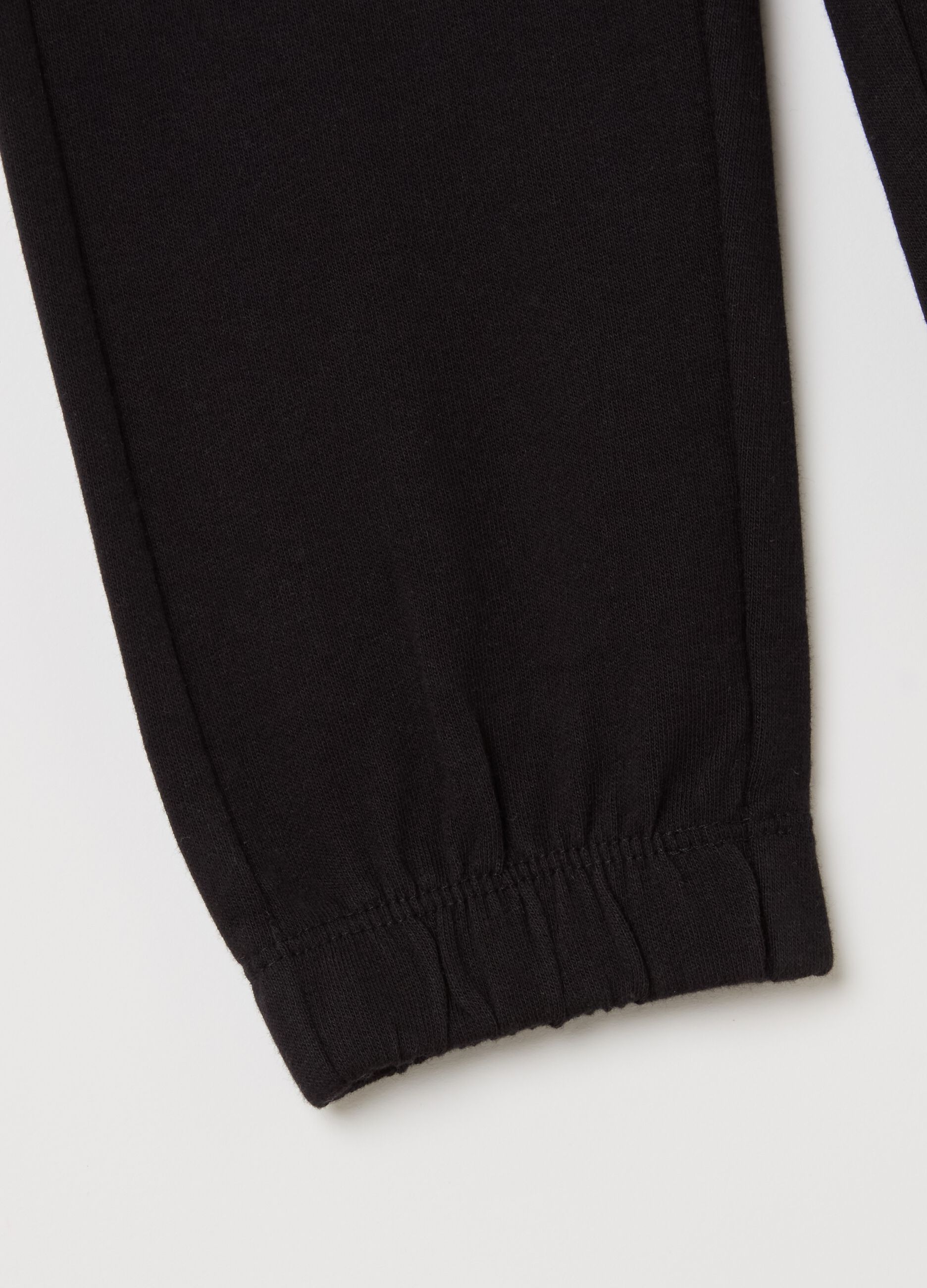 Joggers with drawstring and elasticated trims
