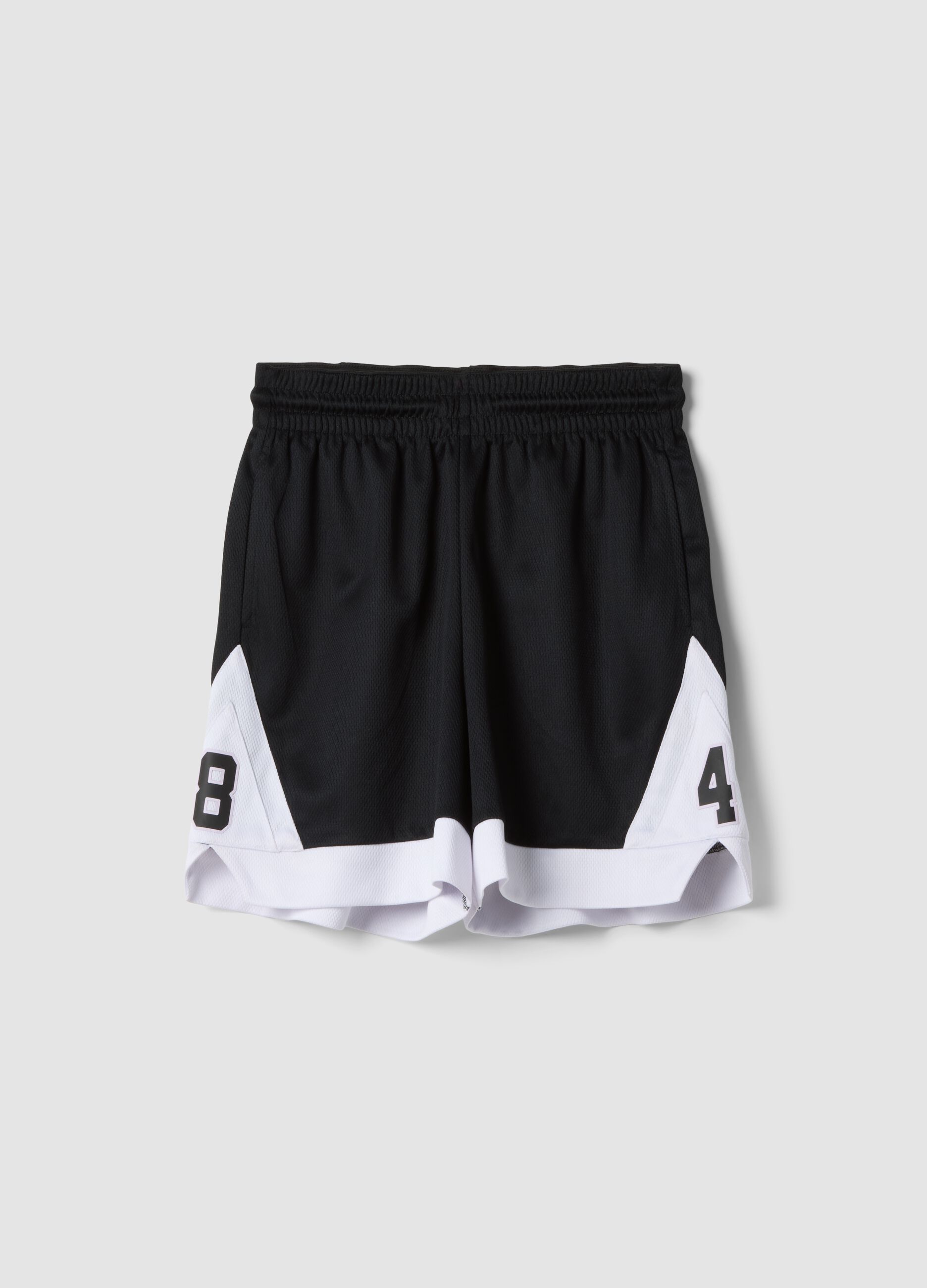 Black sporty shorts with white inserts