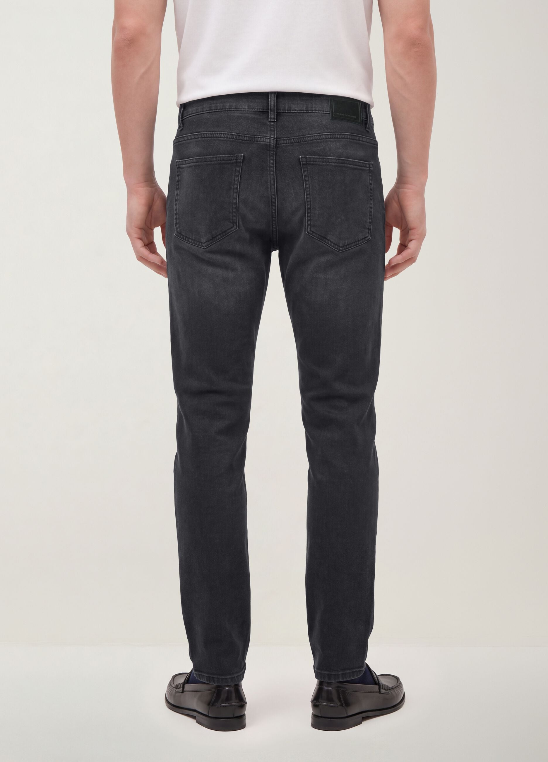 Black slim-fit stretch cotton denim jeans
