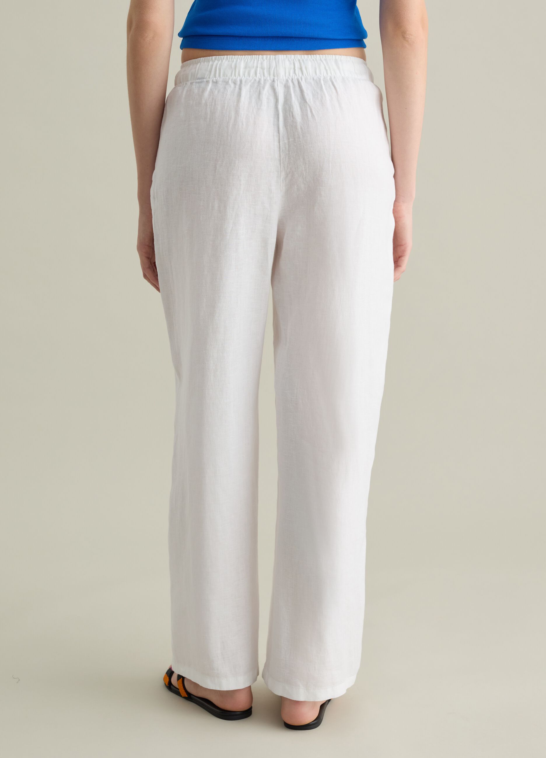 White wide-leg fluid trousers in linen