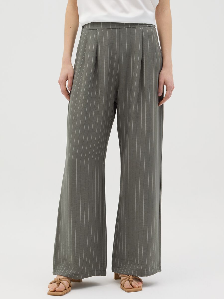 Green palazzo trousers with striped pattern_1