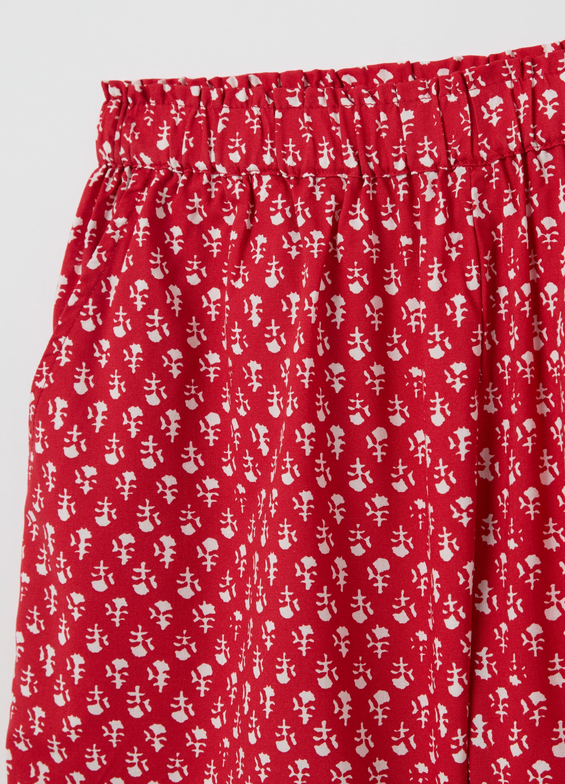 Red viscose shorts with ethnic pattern