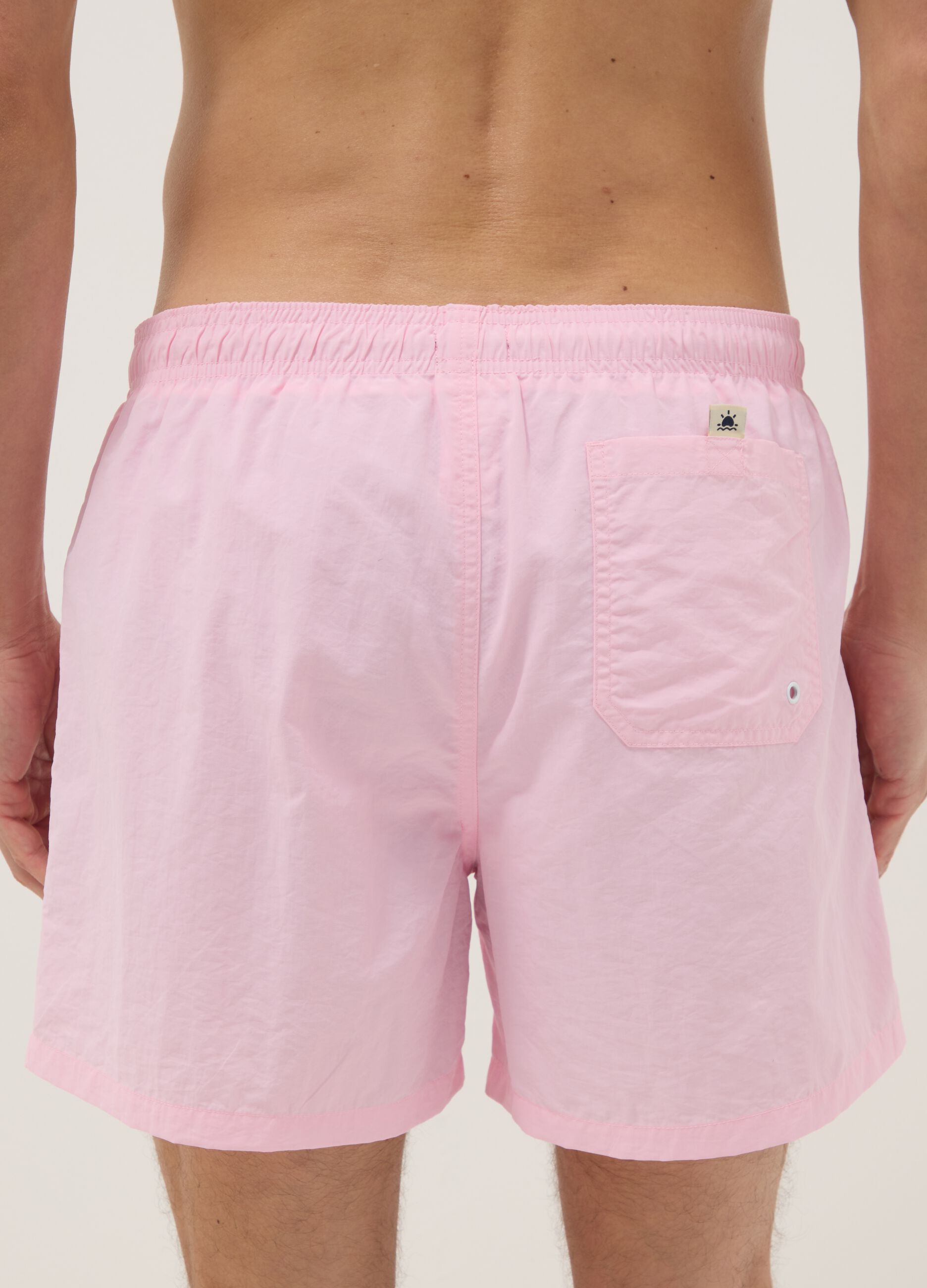 Pink swim shorts with elasticated waist