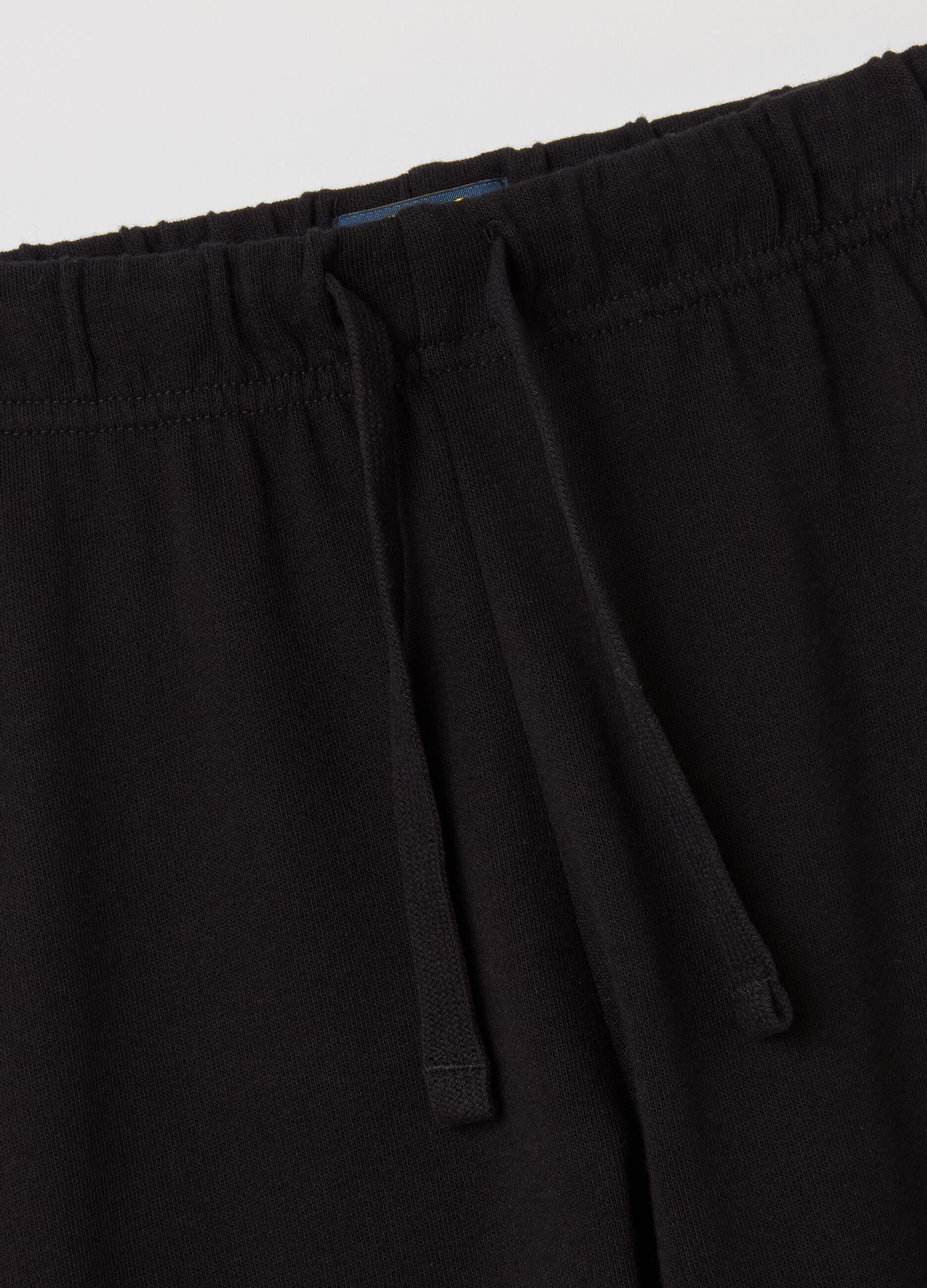 Joggers con coulisse e profili elasticati 
