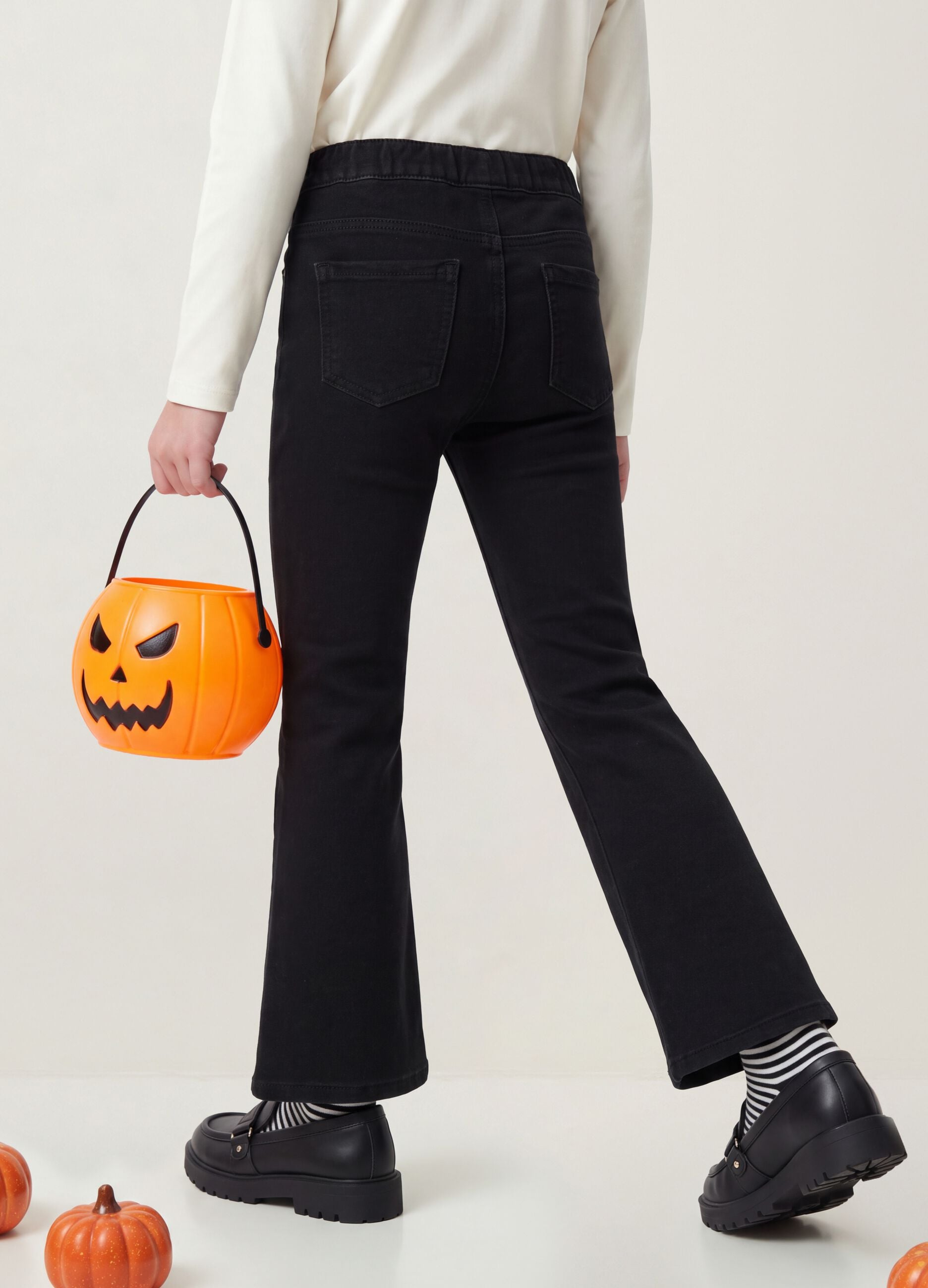 Jeggings nero flare in cotone elasticizzato per bambina