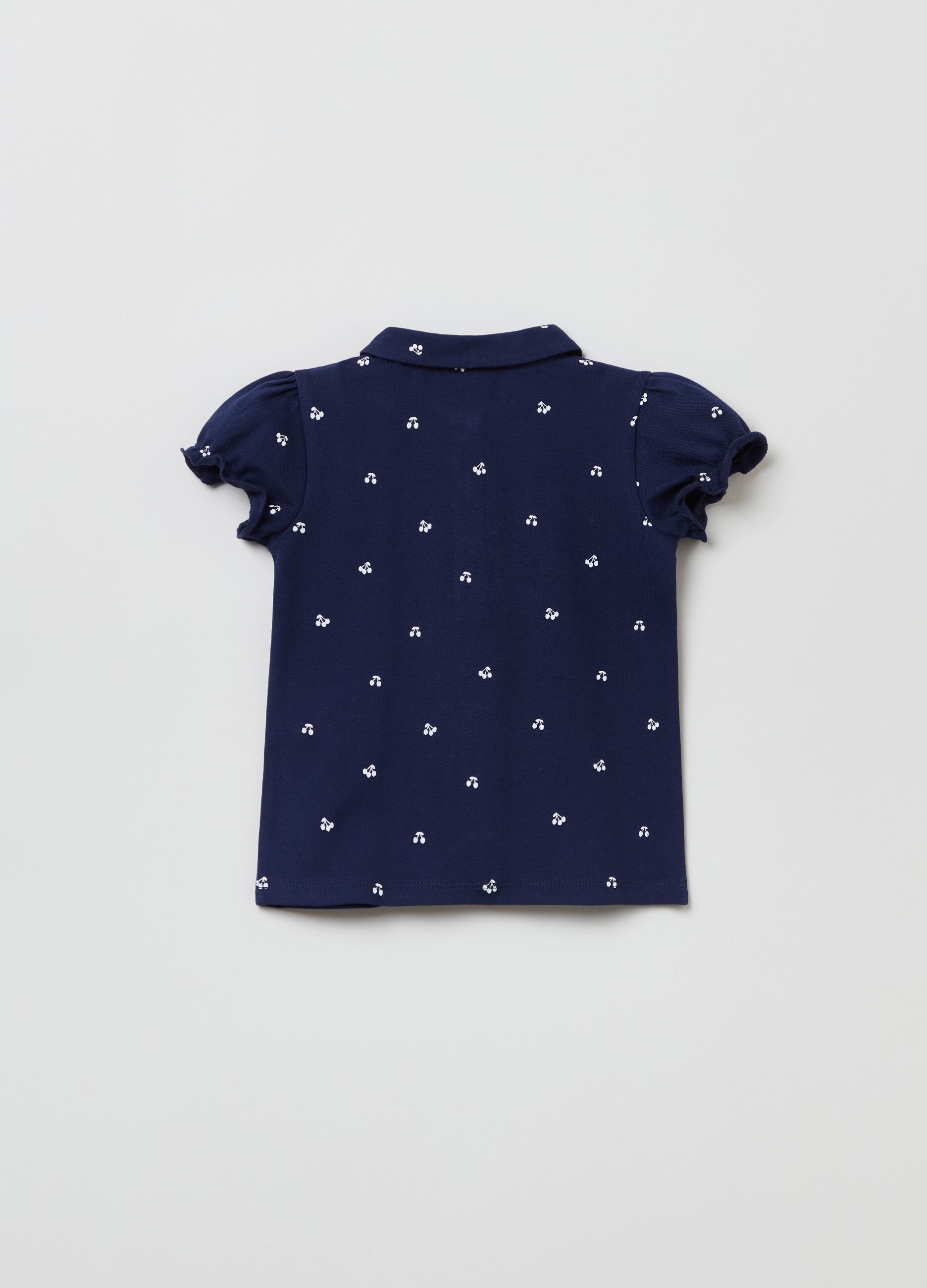 Piquet polo shirt with all-over cherries print