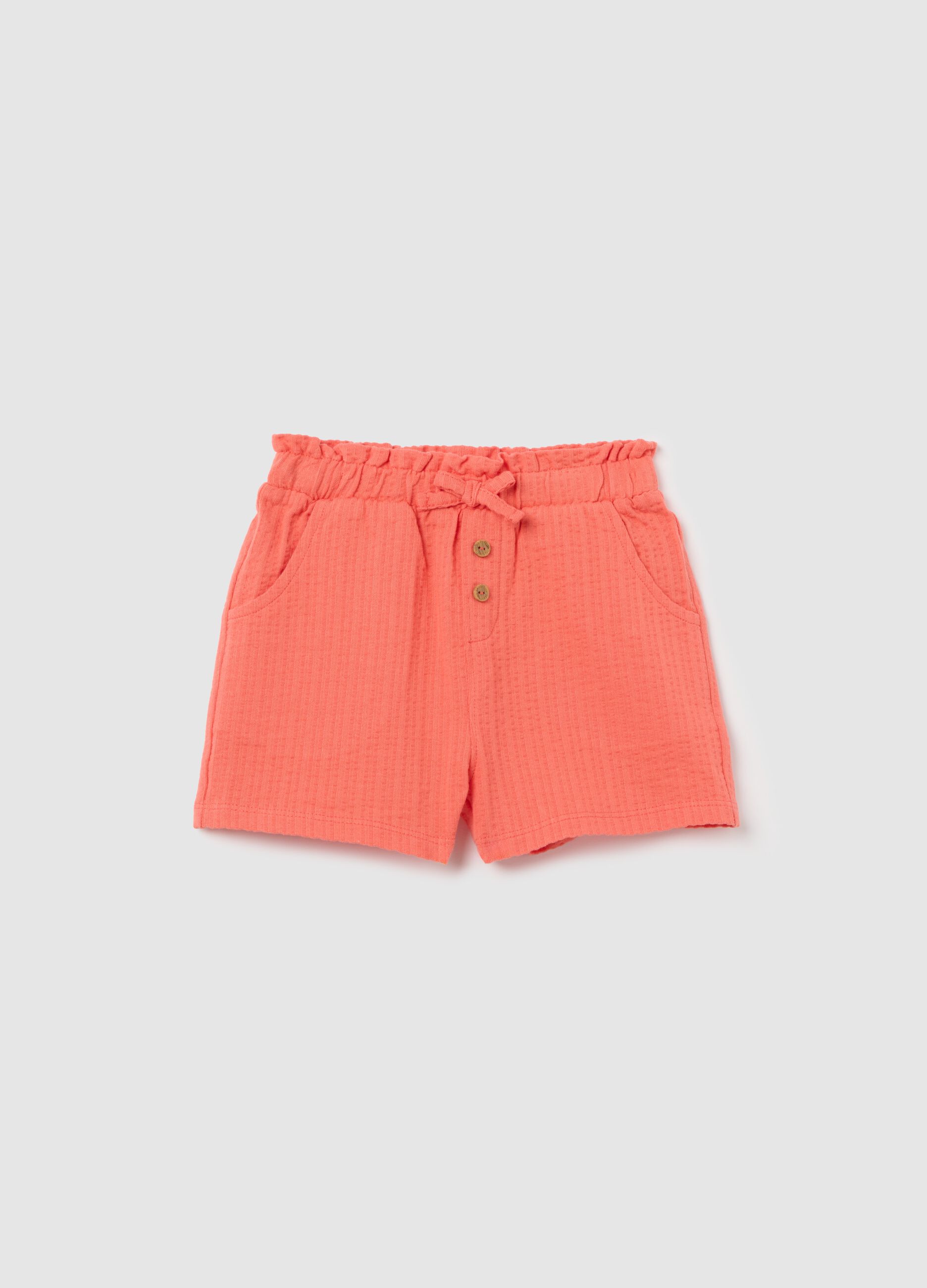 Girls’ shorts in 100% orange cotton with regular fit