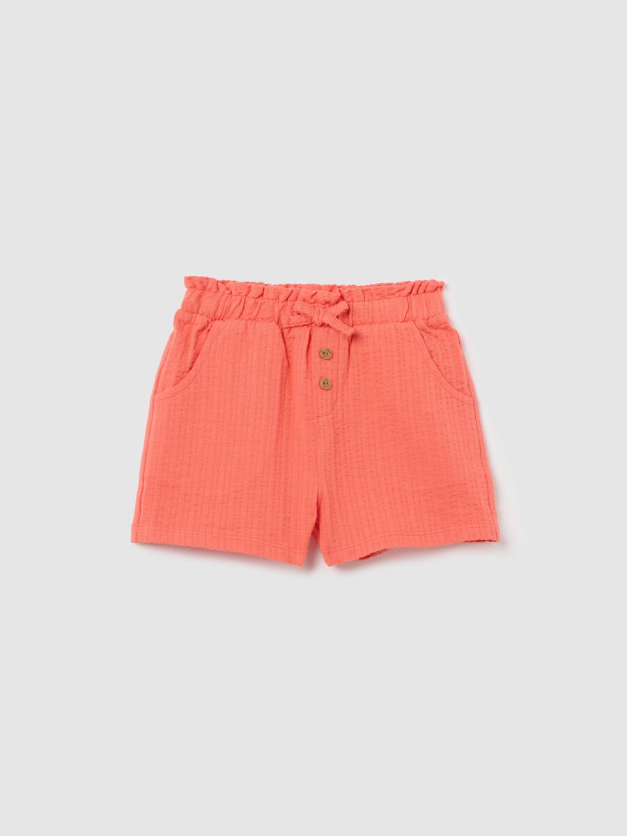 Girls’ shorts in 100% orange cotton with regular fit_0