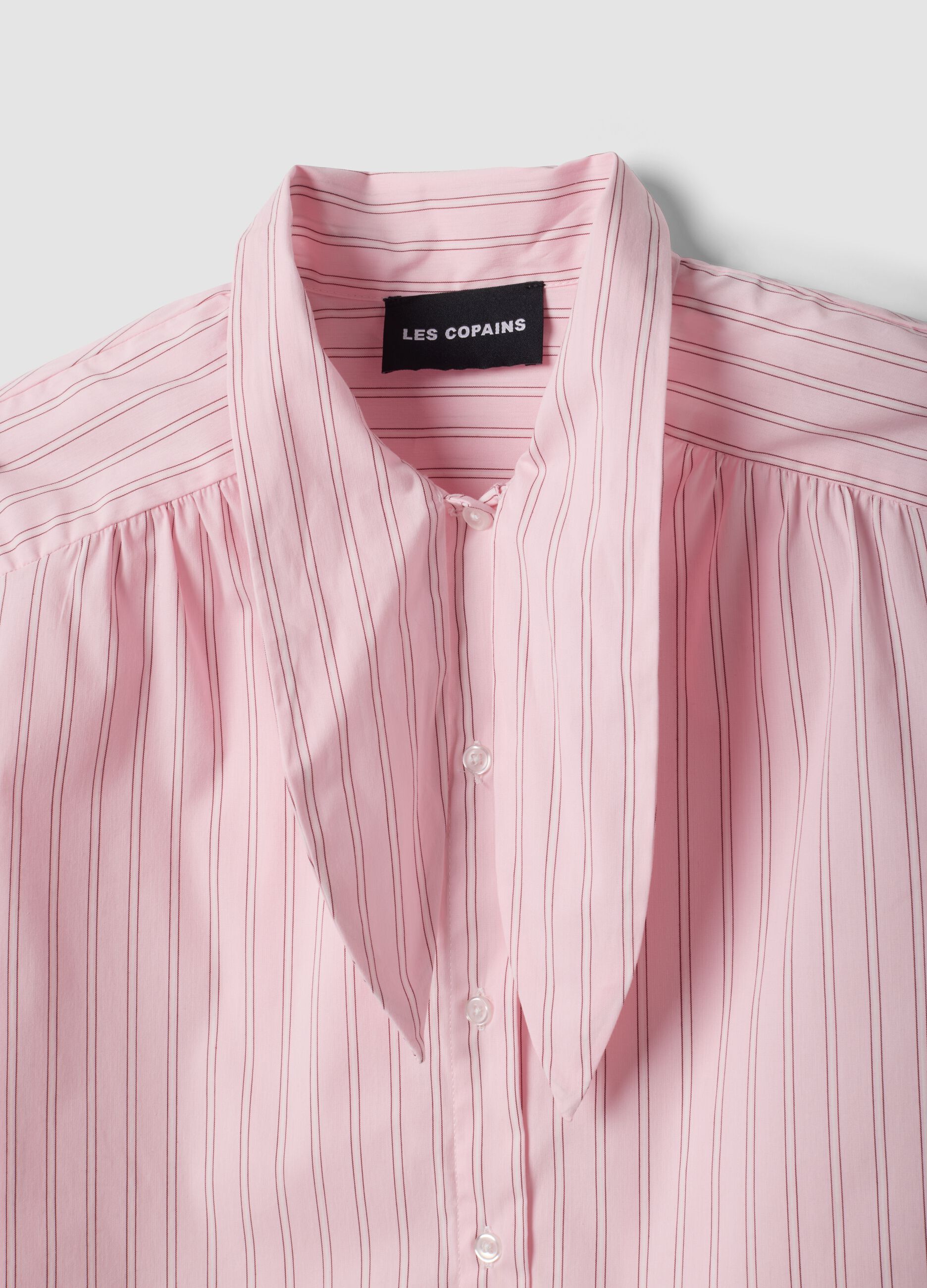 Camicia rosa in cotone elasticizzato a righe con fiocco over fit