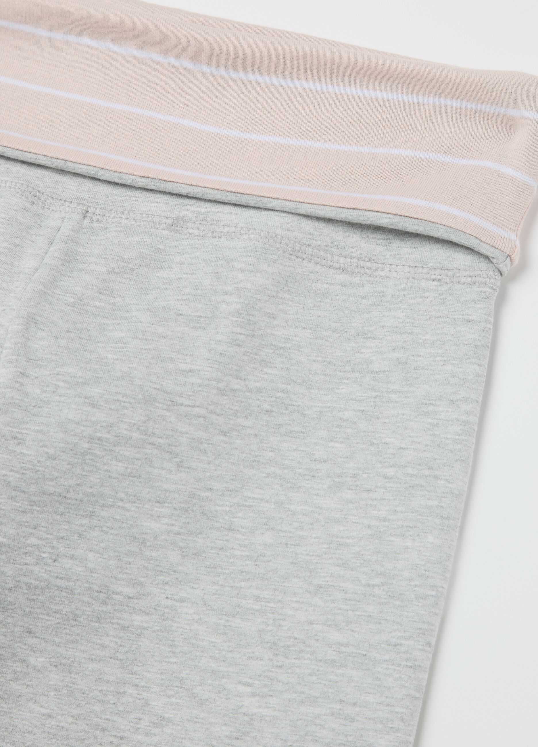 Grey flare-fit leggings with striped fold at the waist