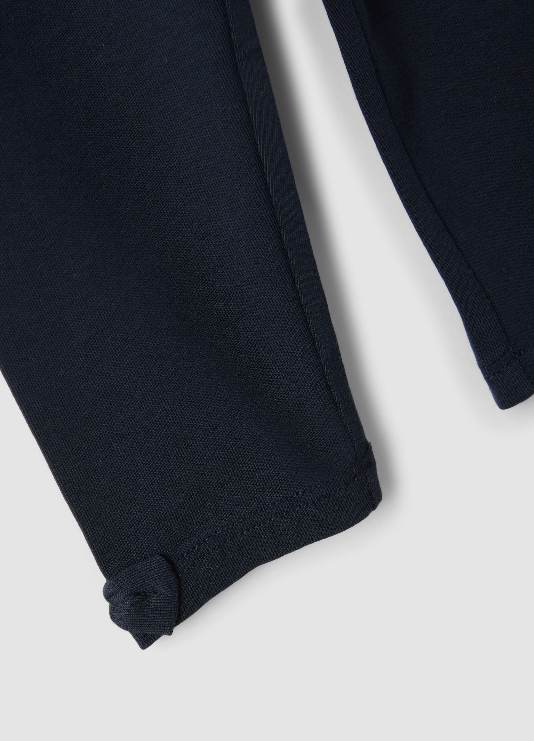Blue stretch organic cotton leggings with bows for baby girl