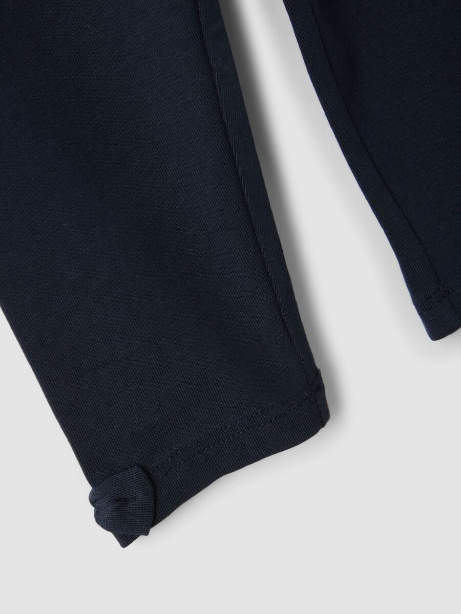 Leggings blu in cotone organico elasticizzato con fiocchi per bimba_2