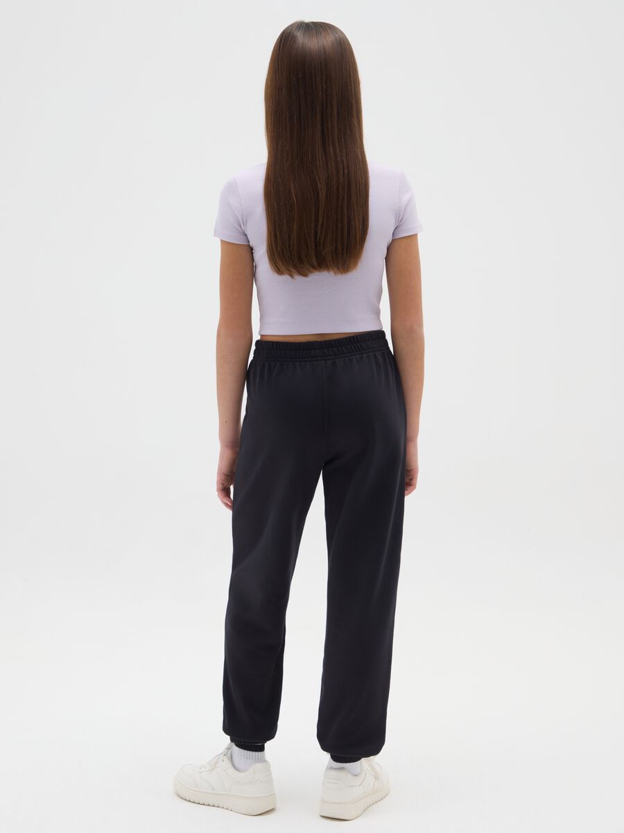 Girls' black jogger trousers in pure cotton with print_1