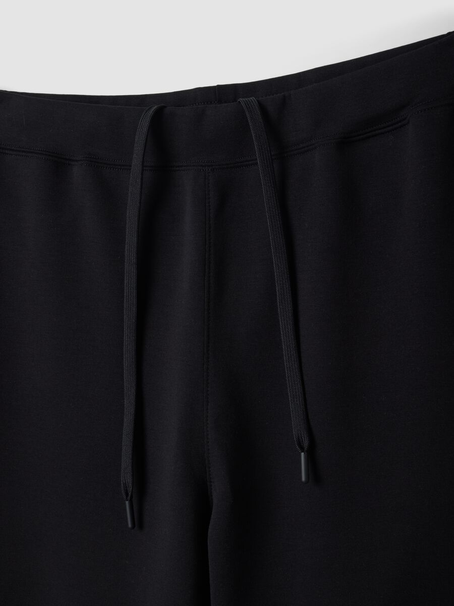 Jogger neri regular fit in tessuto elasticizzato Easy dry_1