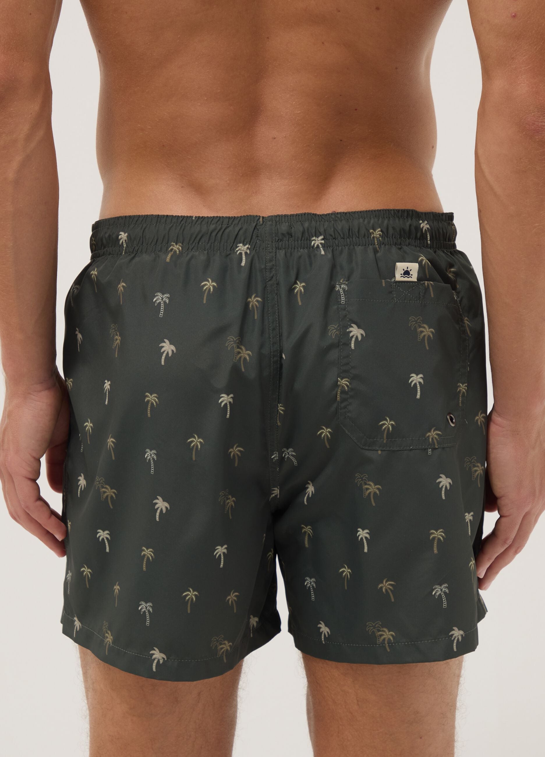 Costume boxer verde con stampa palme