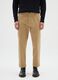 Beige stretch cotton carrot fit trousers_1