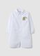 White nursery apron with zip and dinosaur embroidery for boys_0