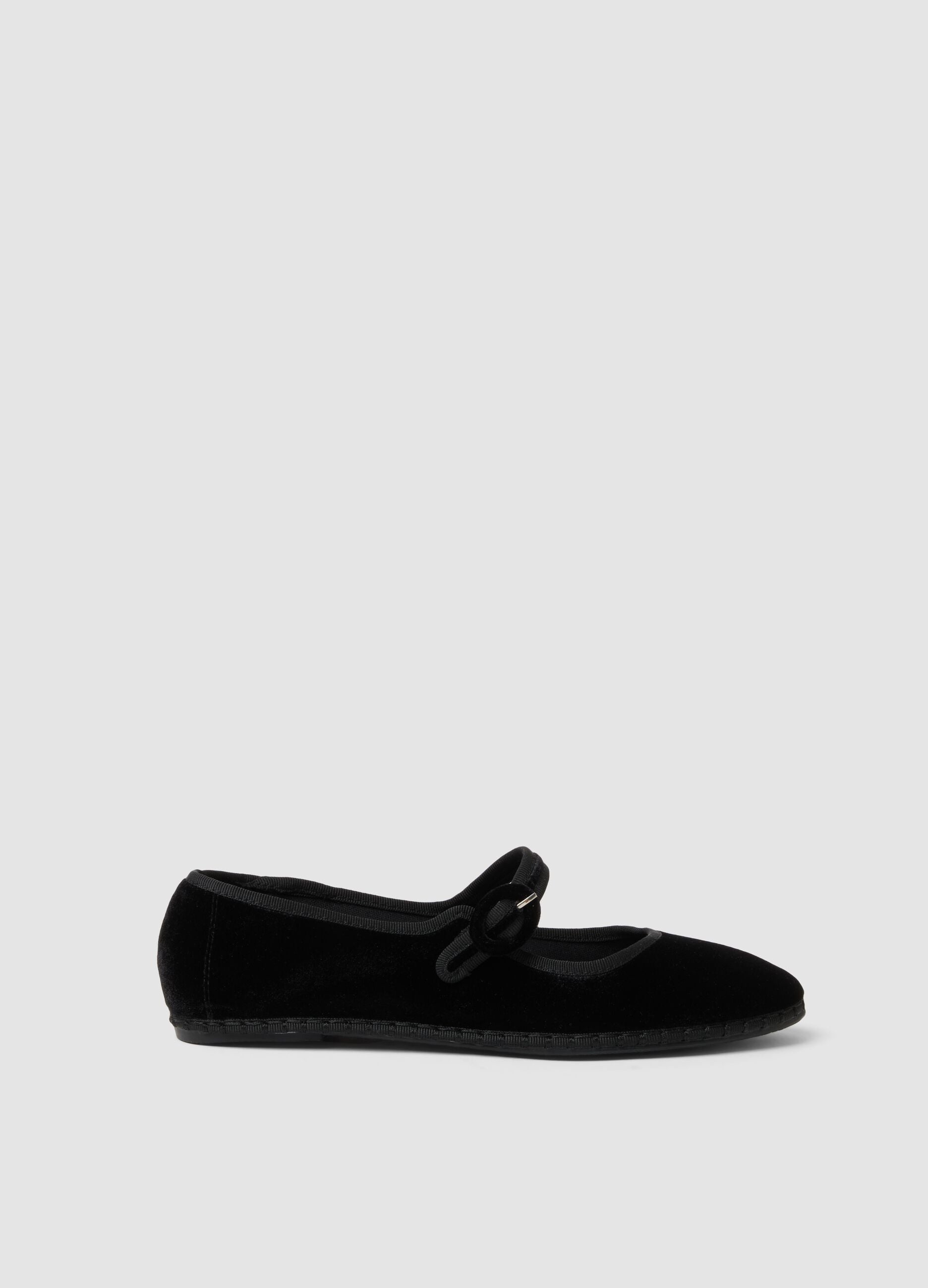 Black ballet flats with strap